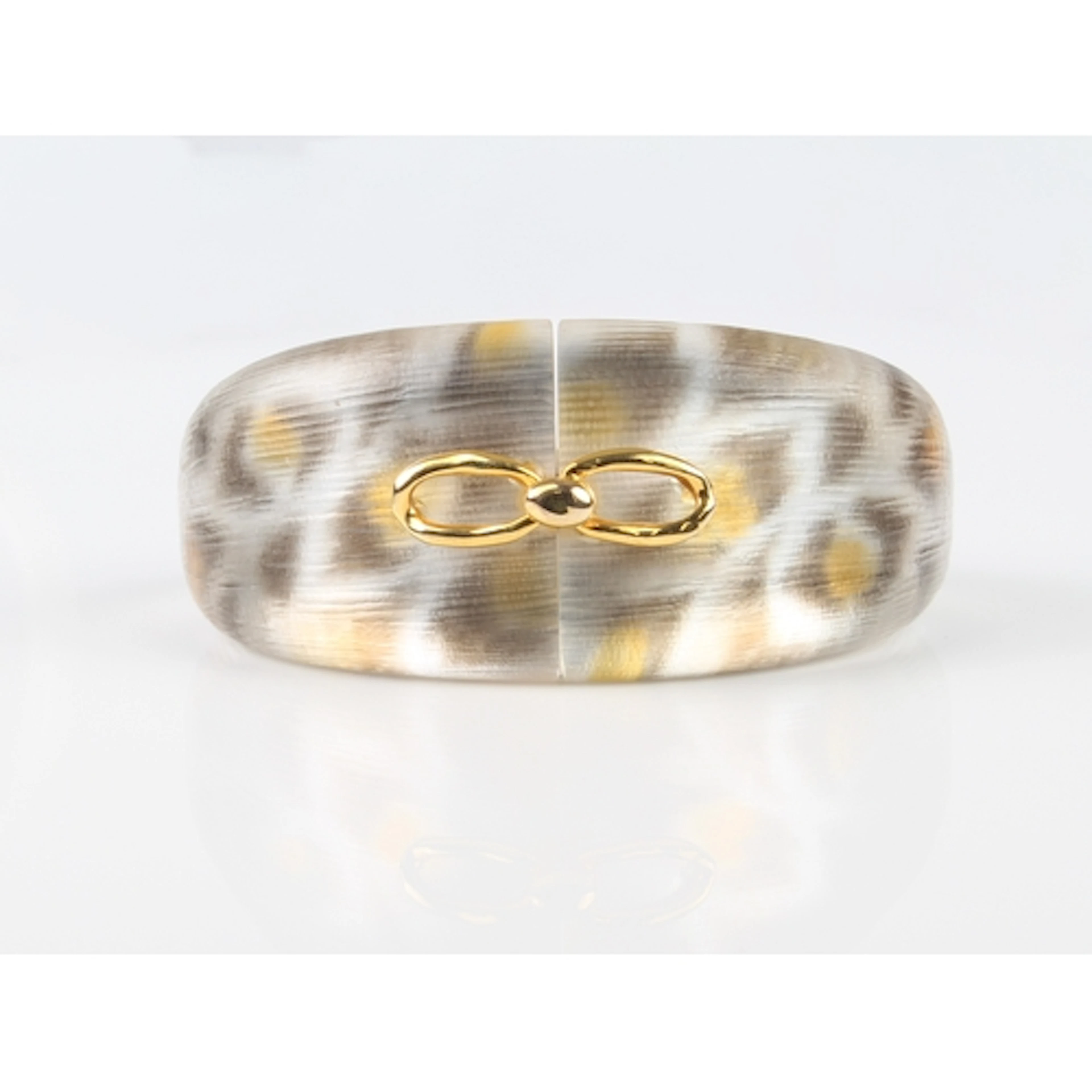 An Alexis Bittar 'Safari' lucite bangle - with gold plated c...