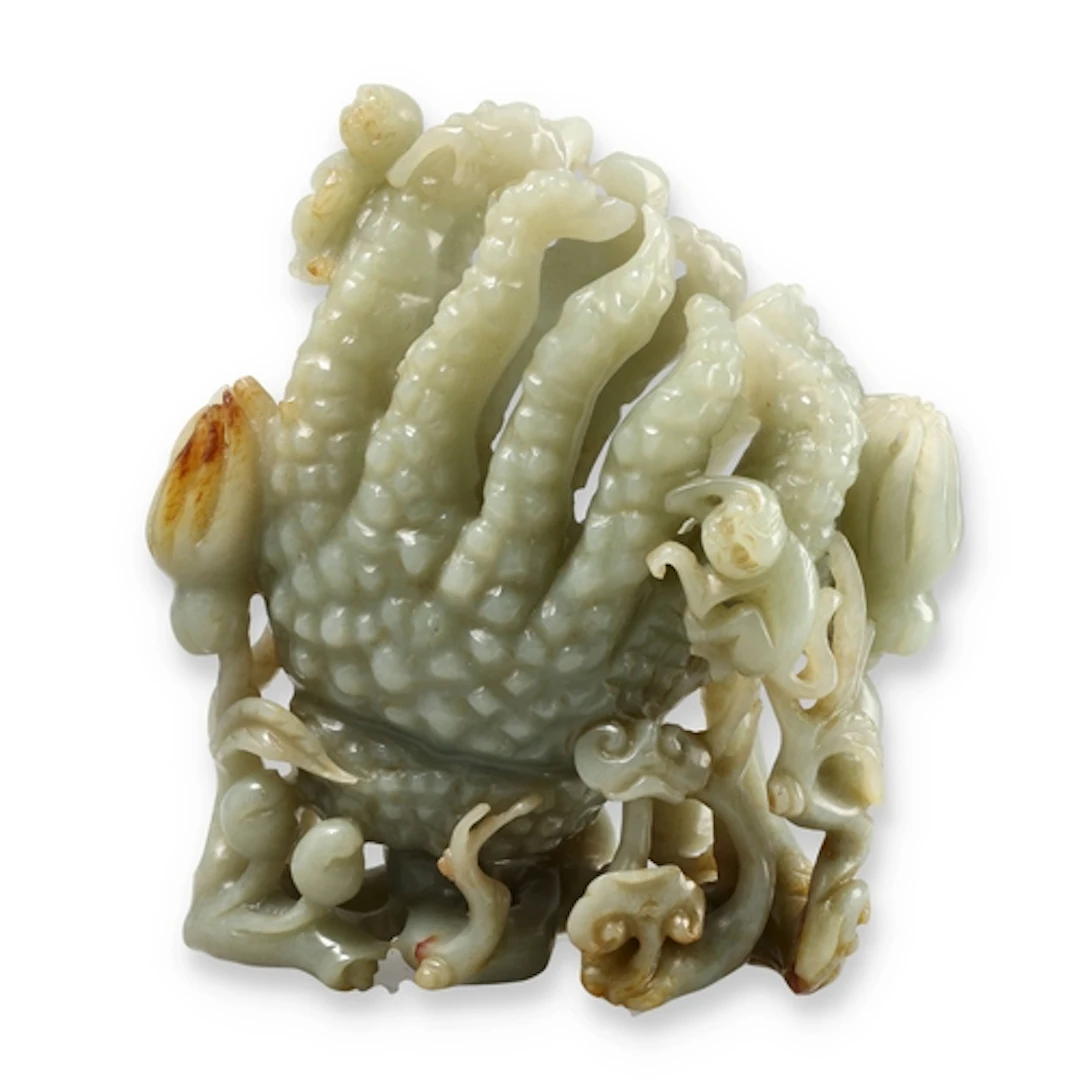A CHINESE CARVED JADE FINGER CITRON (BUDDHA'S HAND) Probably...