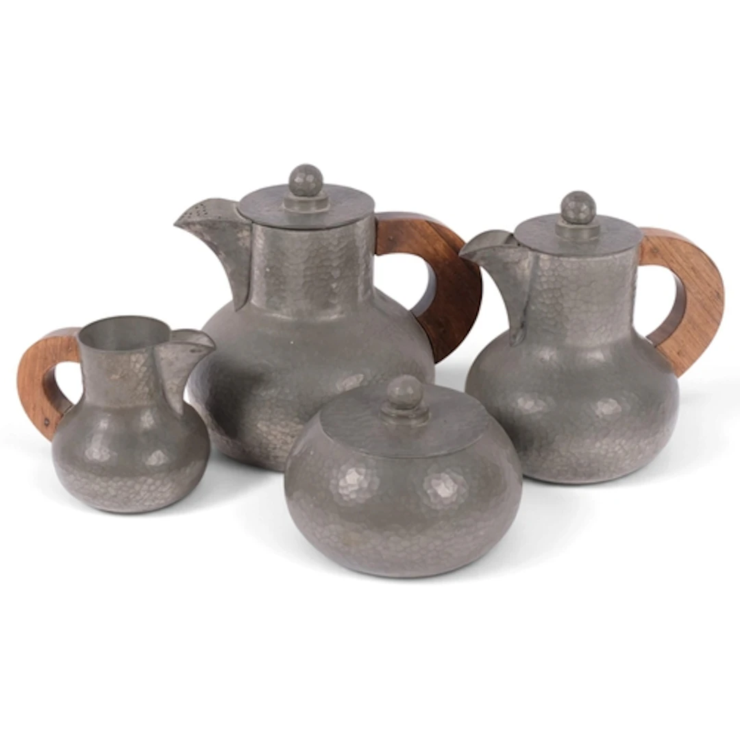 Jean Despres, Arts and Crafts 4-piece hammered pewter coffee...