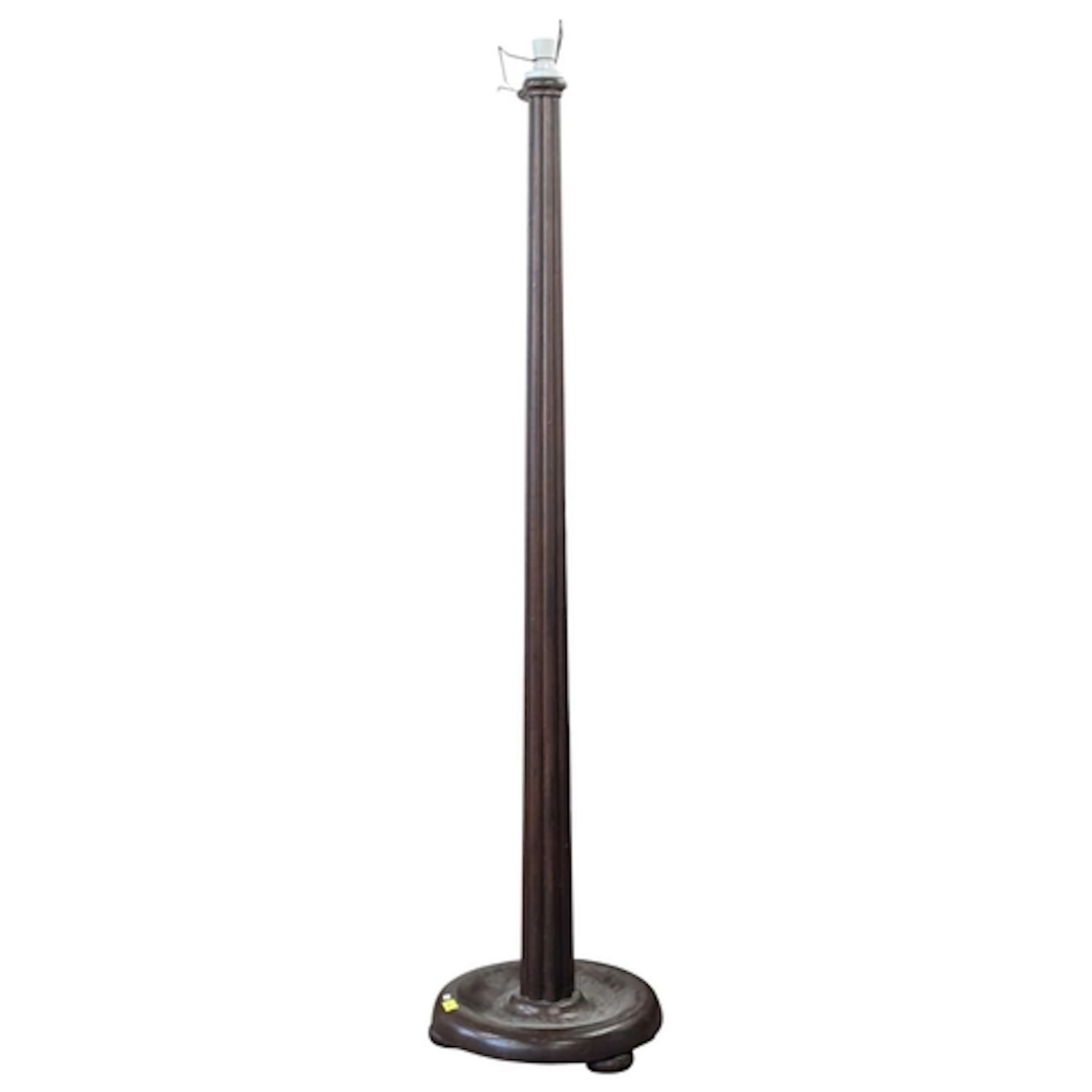 A 19th century mahogany reeded floor standing standard lamp....