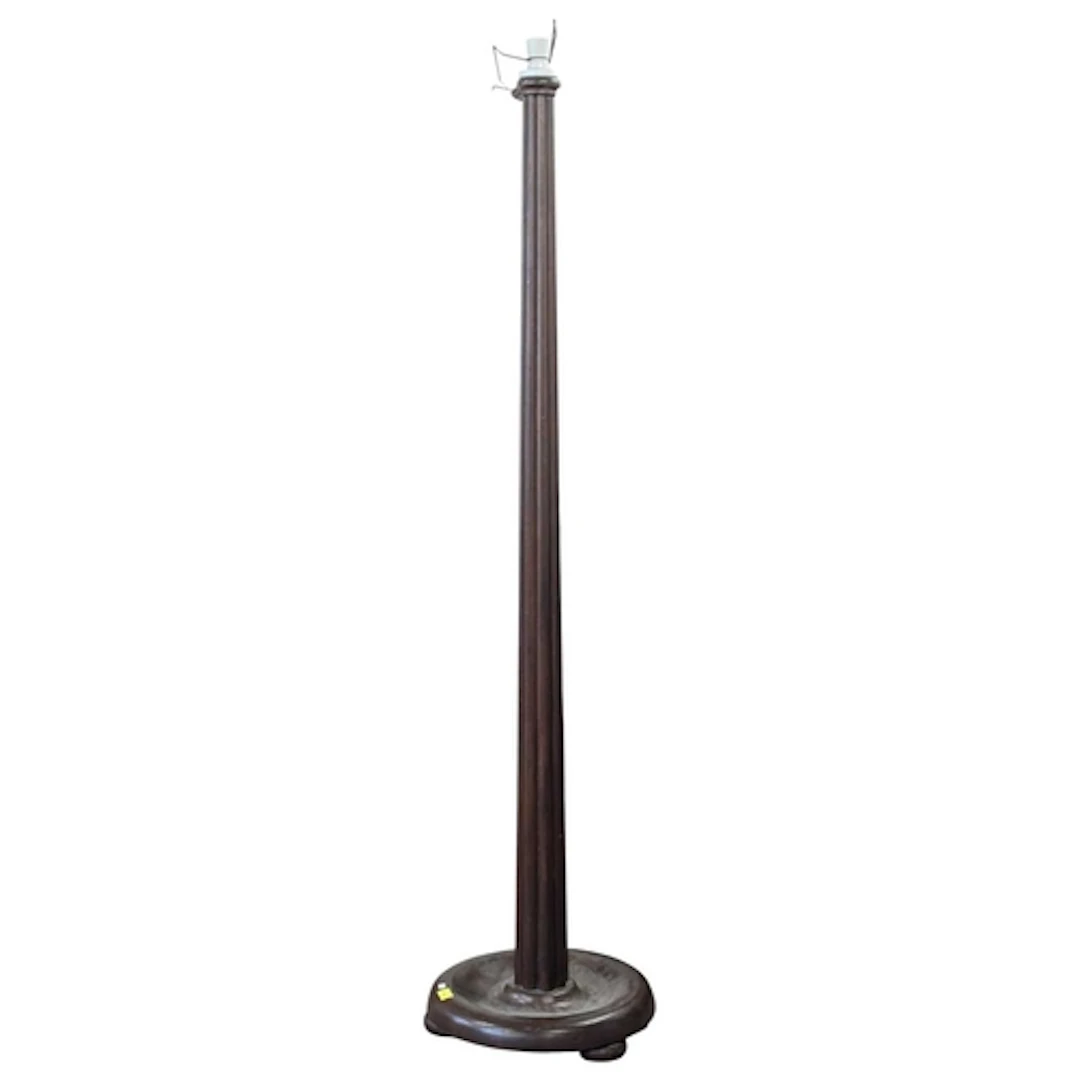 A 19th century mahogany reeded floor standing standard lamp....