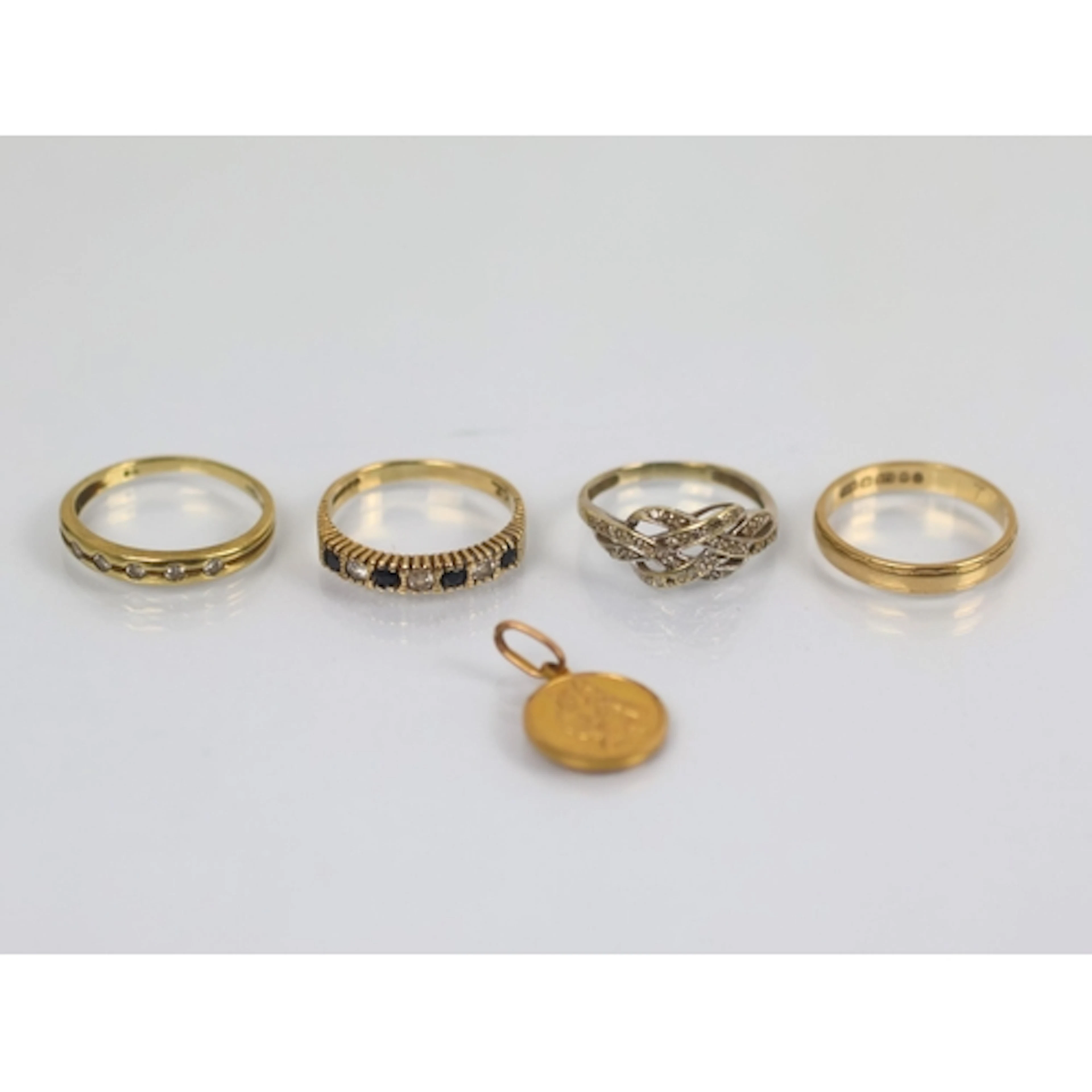 A selection of rings, including a 9ct gold wedding band, rin...