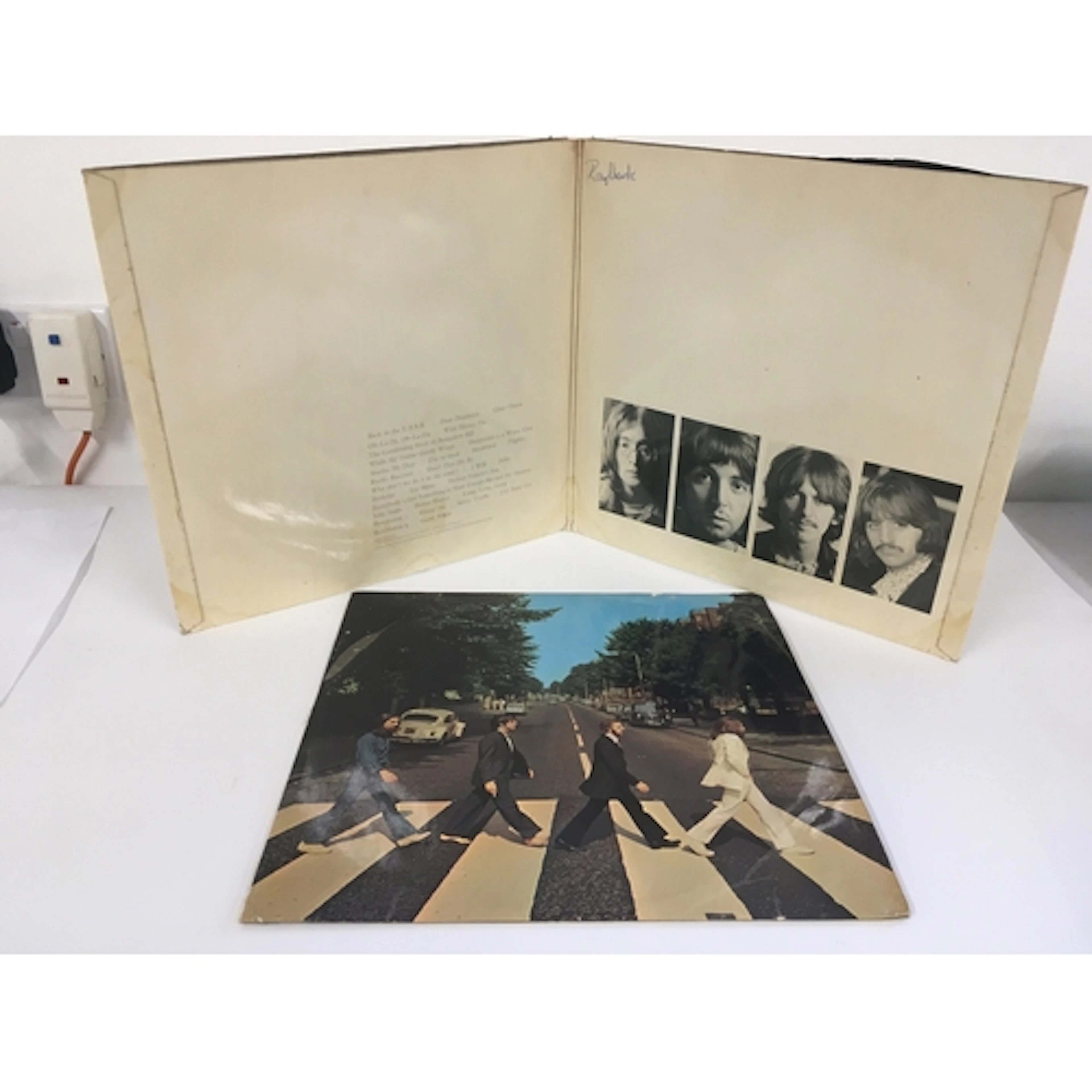 A numbered Beatles White Album with poster but missing portr...