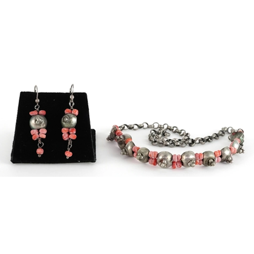 Unmarked silver and coral coloured bead necklace and a pair ...