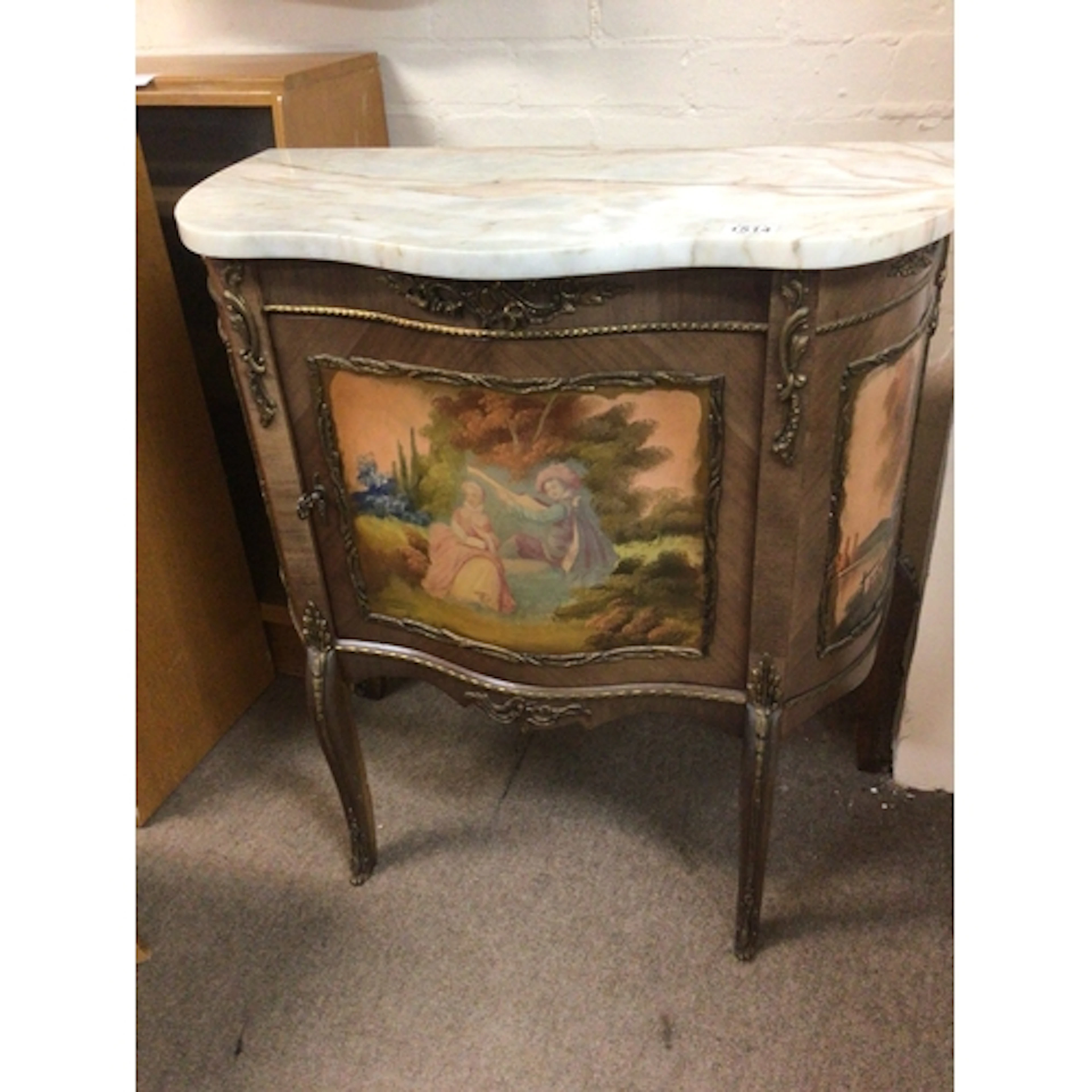A French Louis XVI style cabinet with a marble top and paint...