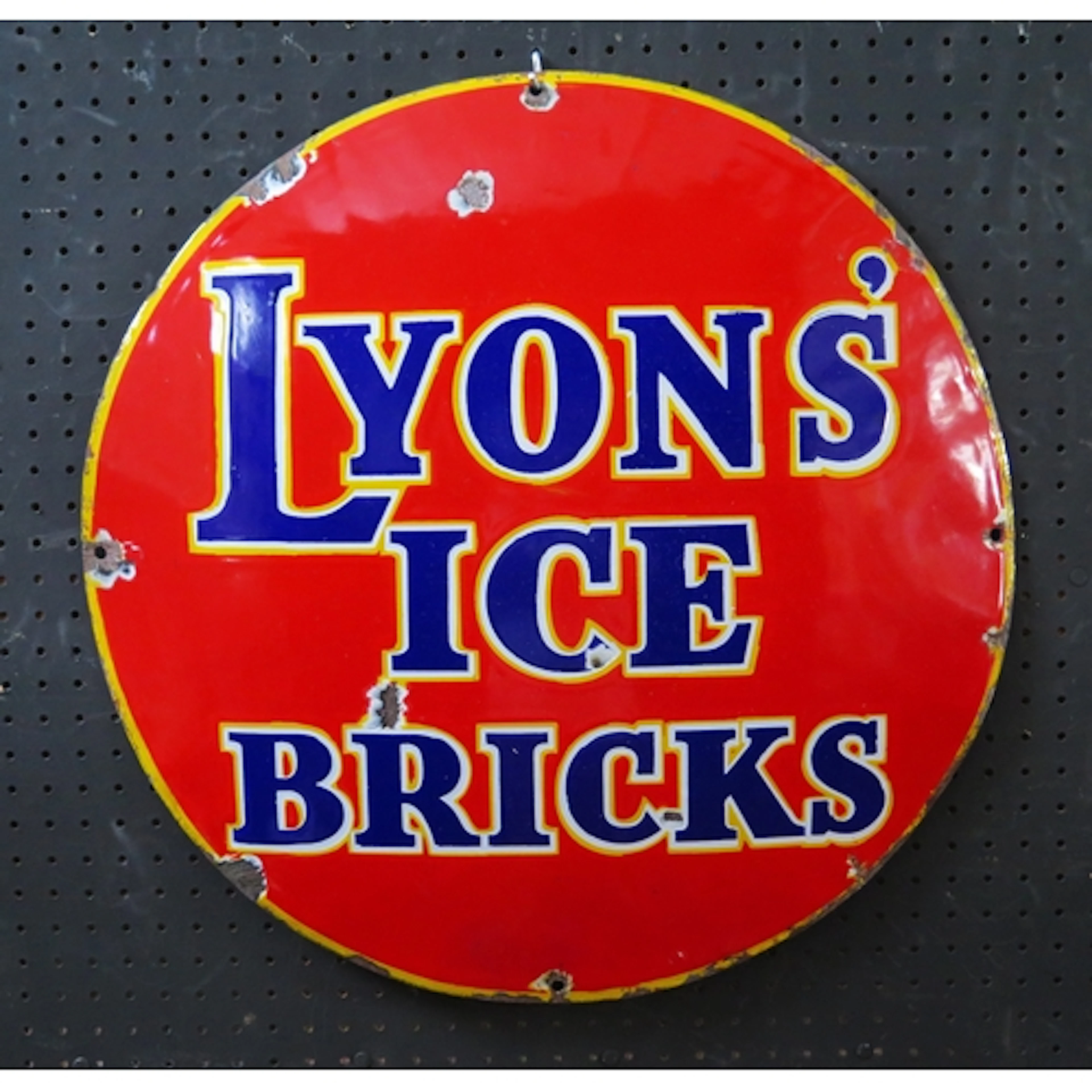 "Lyons Ice Bricks" - an enamel circular advertising sign, 50...