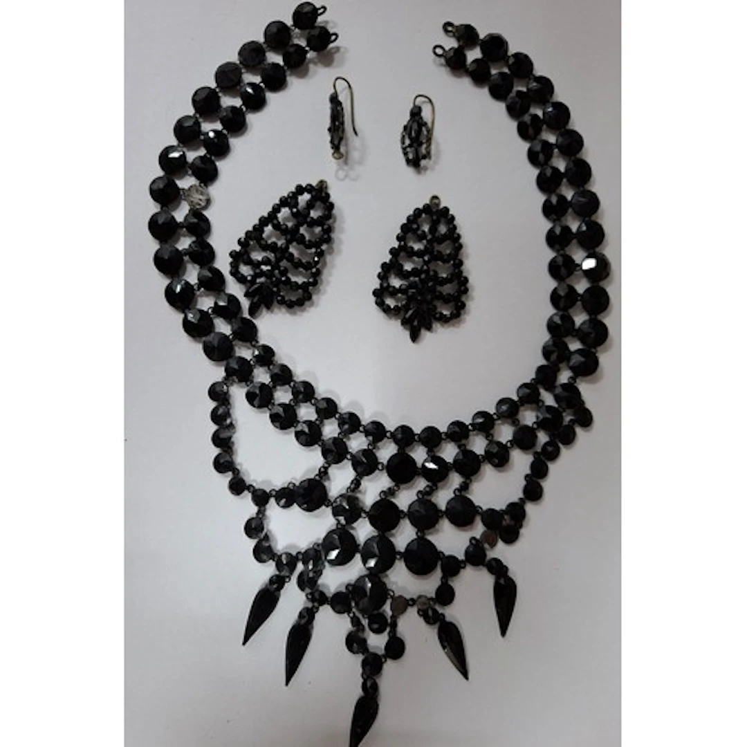A vintage black jet style bib choker necklace with matched e...