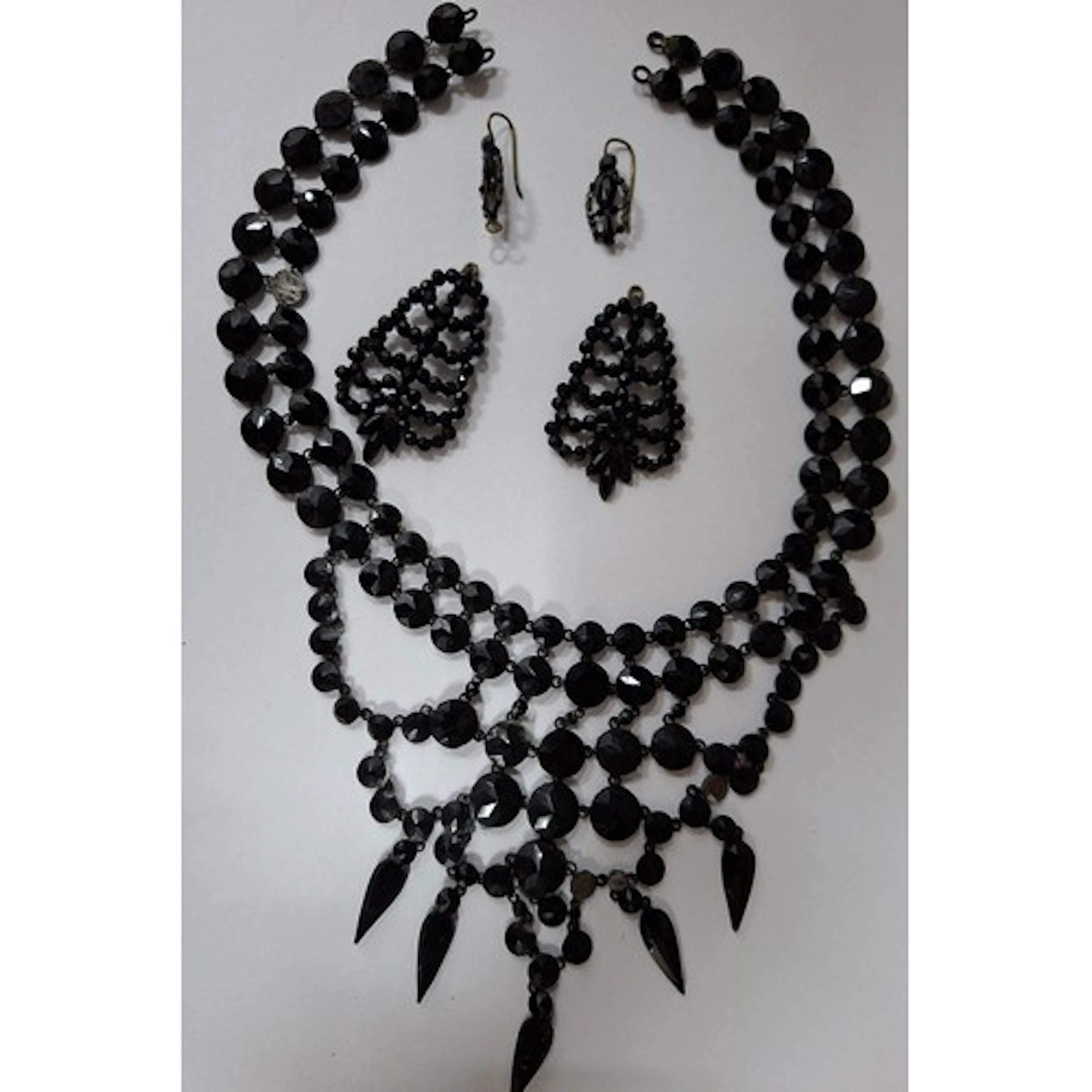 A vintage black jet style bib choker necklace with matched e...