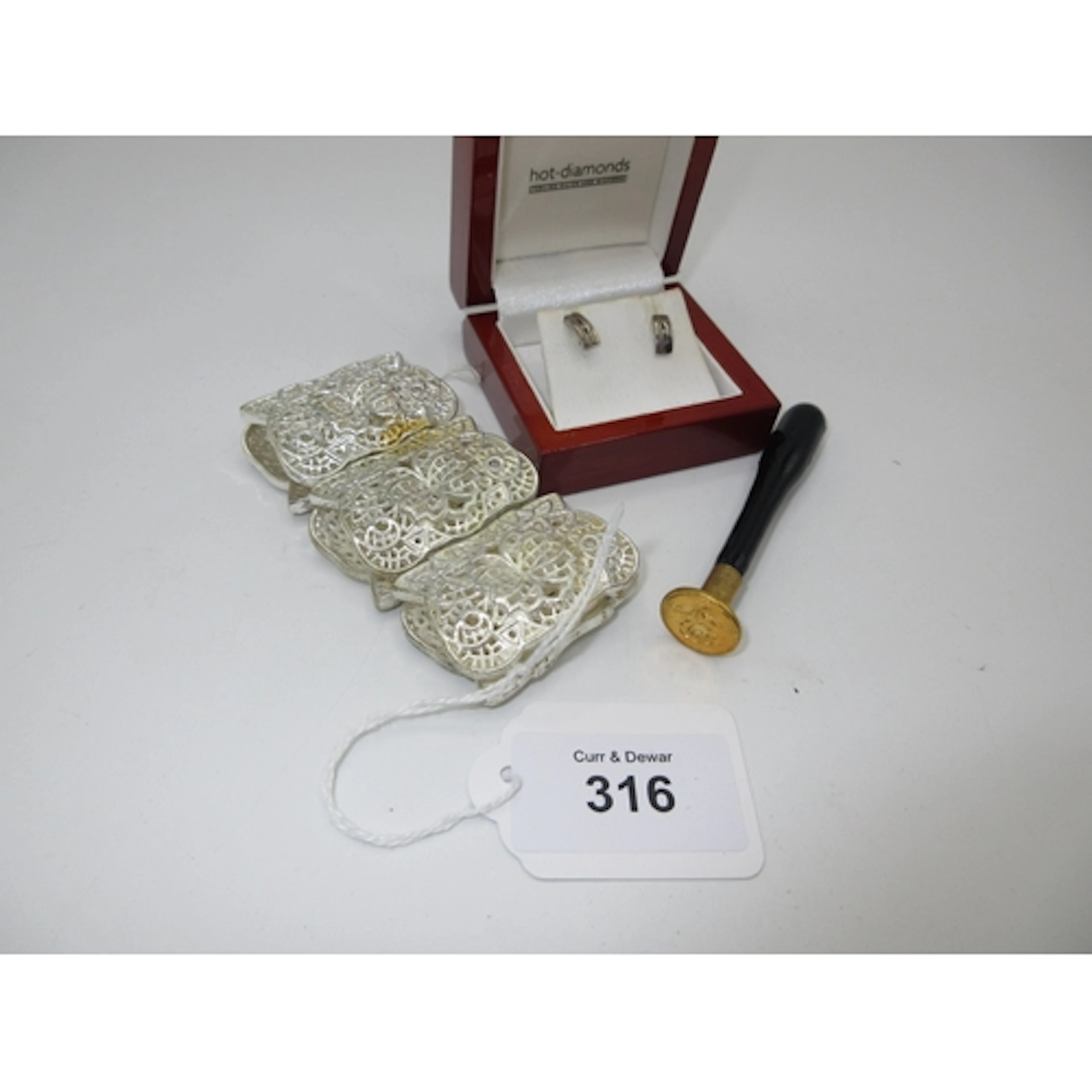 Pair of Silver Hot Diamonds Earrings, Bracelet and Seal