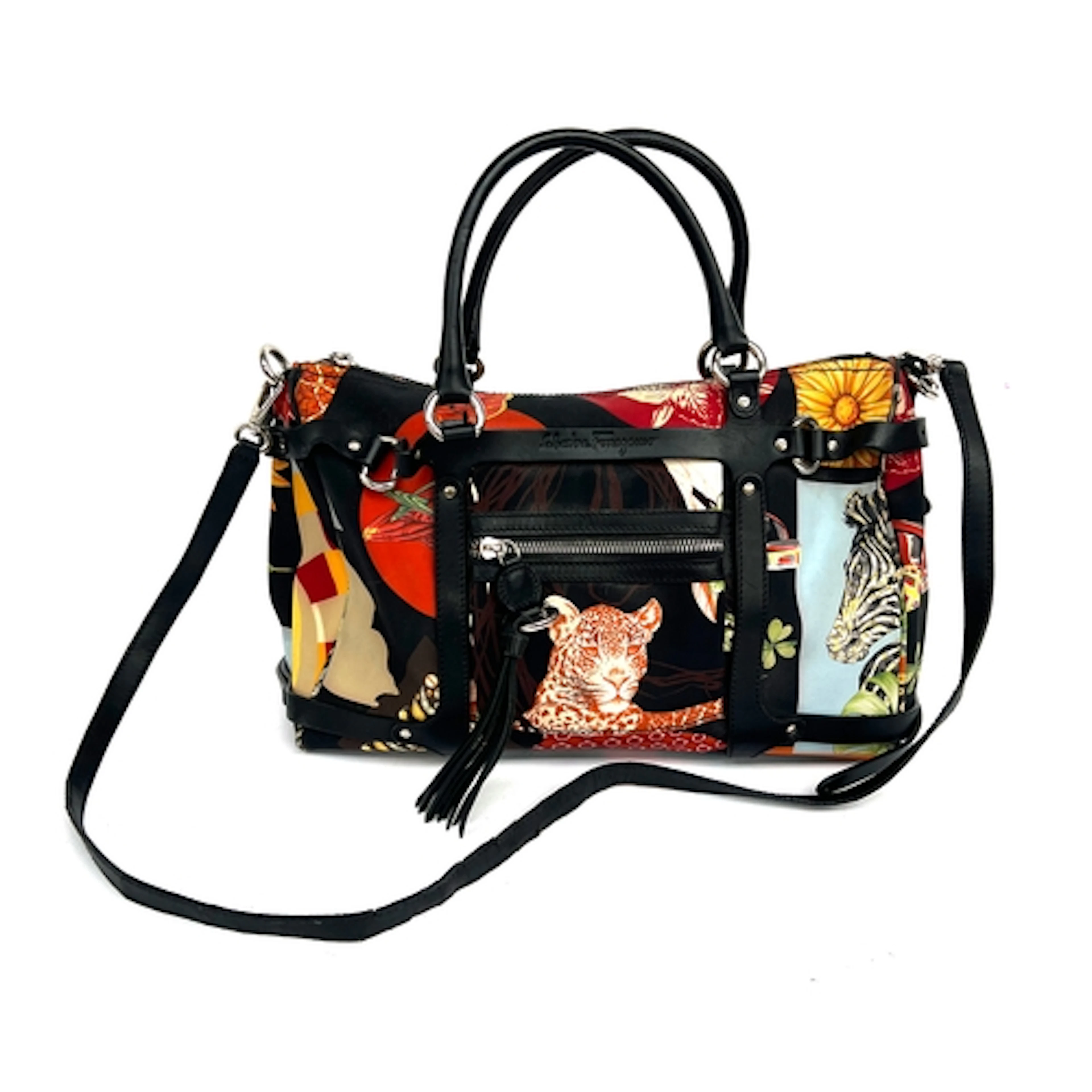 A Salvatorre Ferragamo black leather and cotton handbag with...