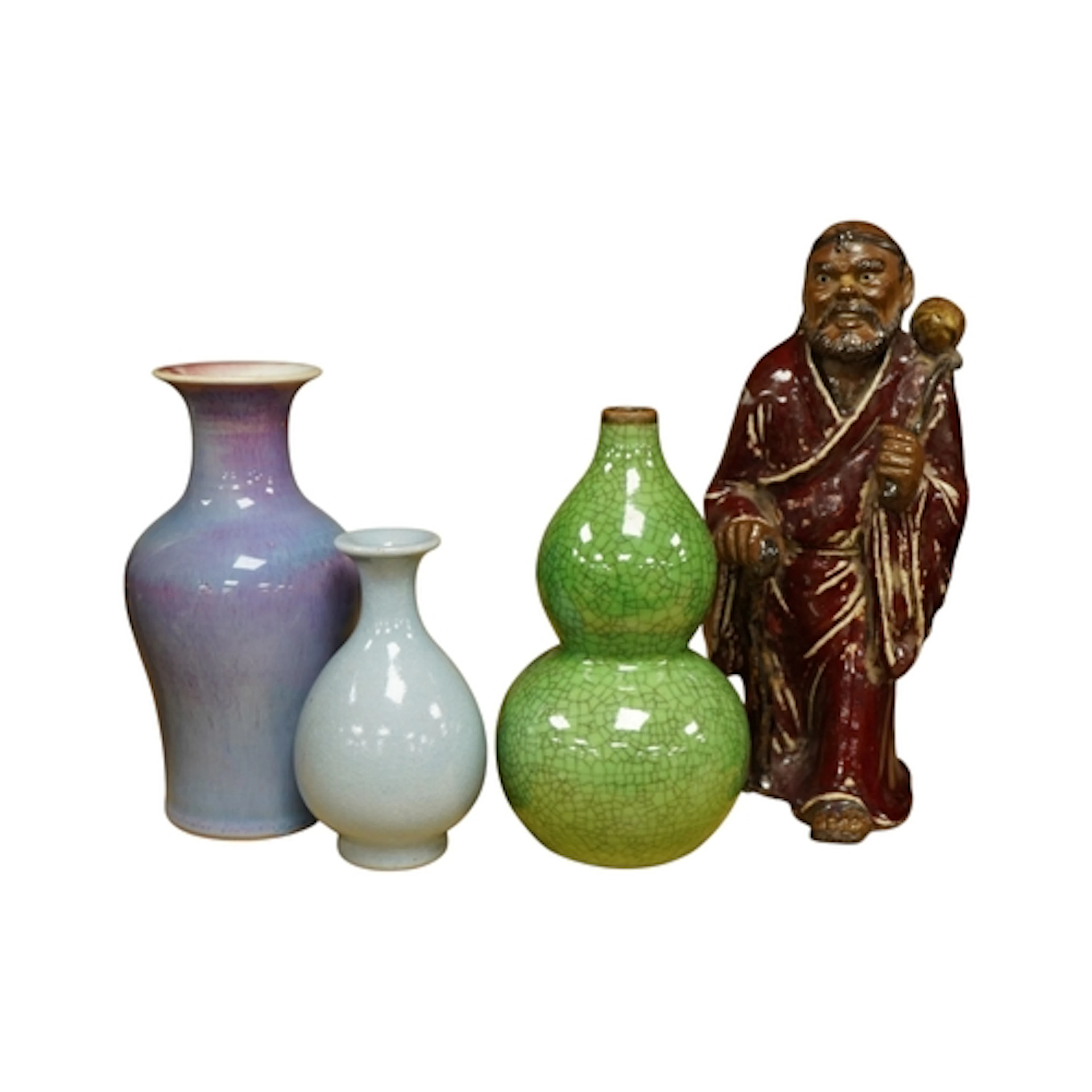 A Chinese pottery figure, height 20cm, a small crackle glaze...