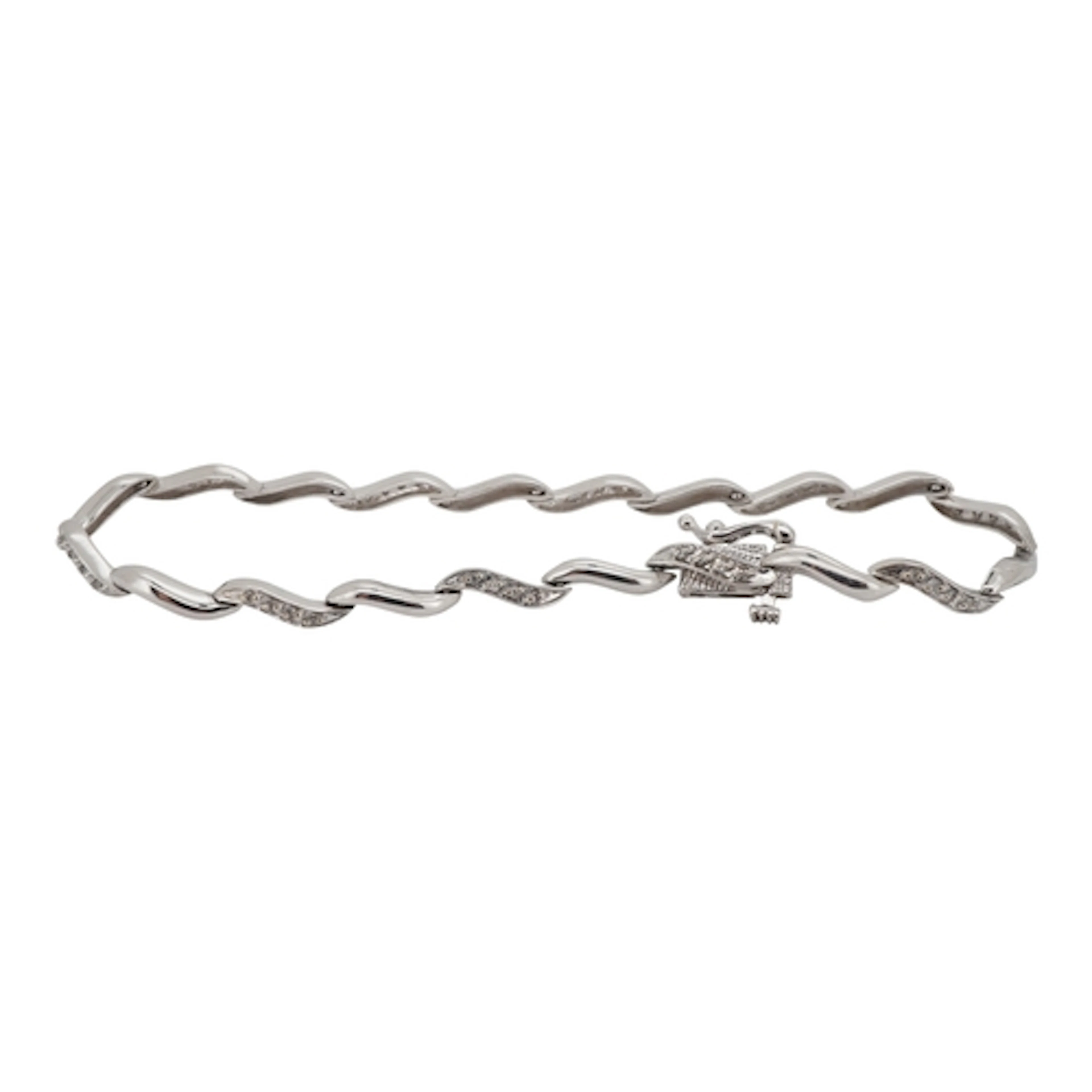 A 9ct white gold and diamond cluster set line bracelet, 18cm...