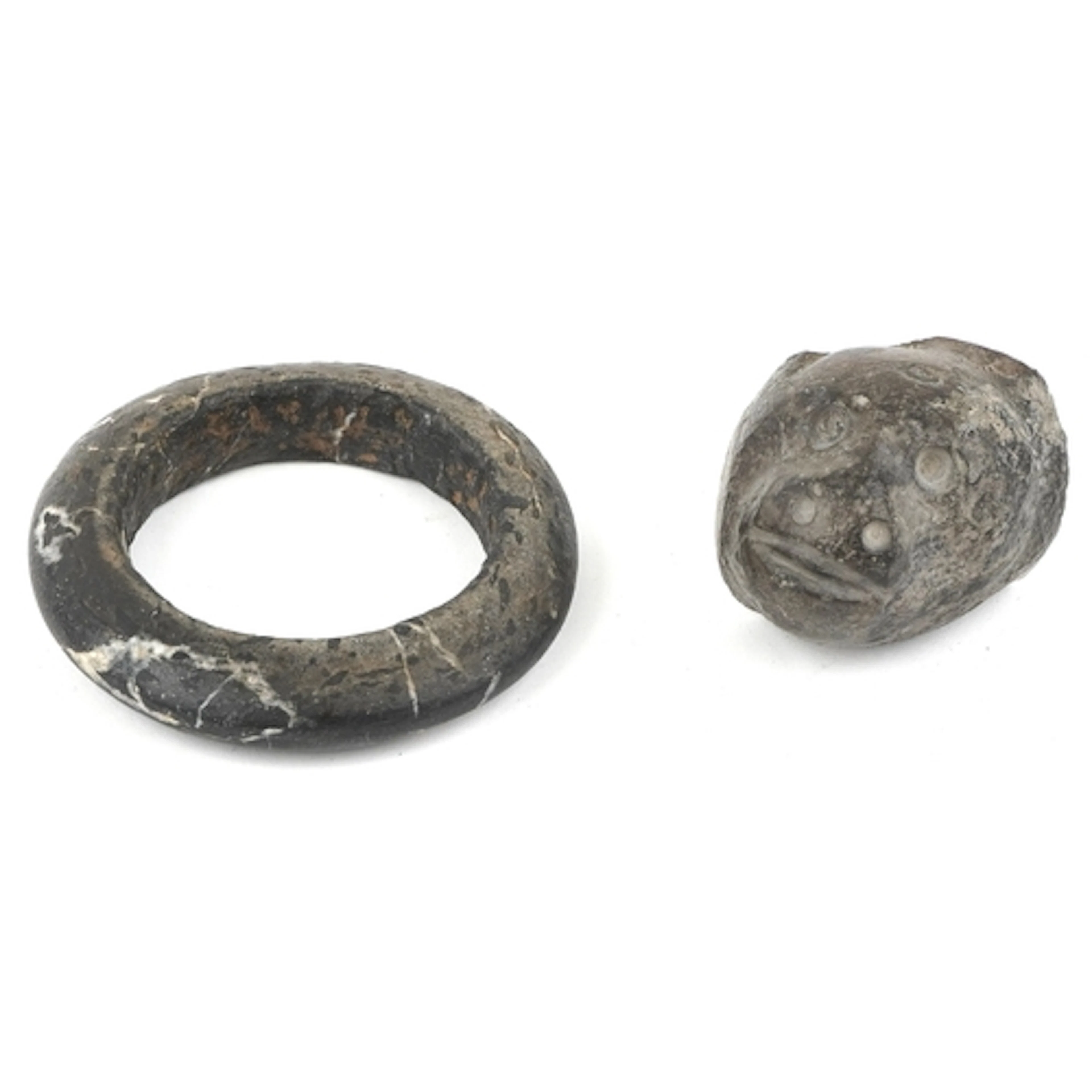 A carved stone bangle, possibly African Dogon tribe, 10cm in...