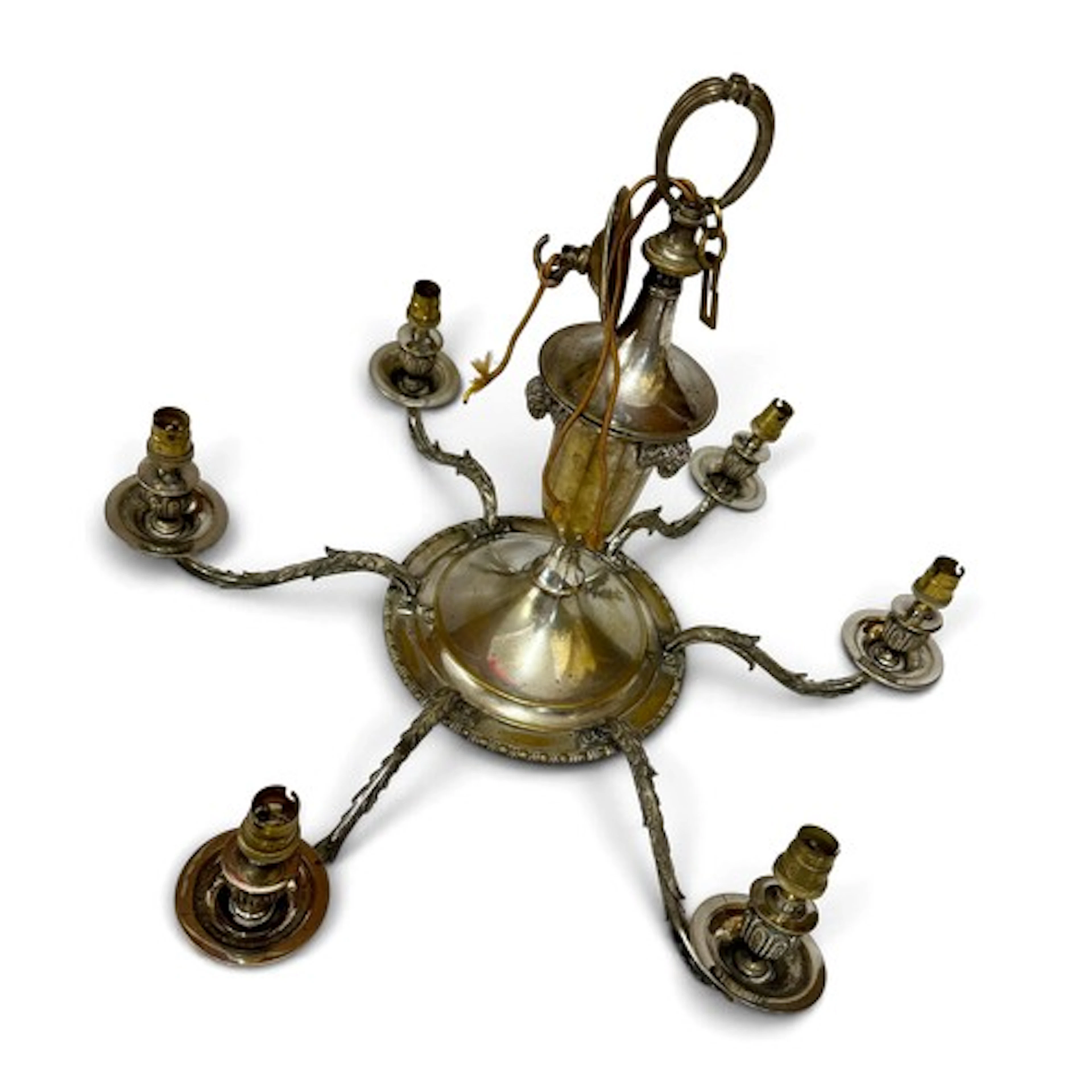 A six arm silverplated chandelier with rams head and scroll ...