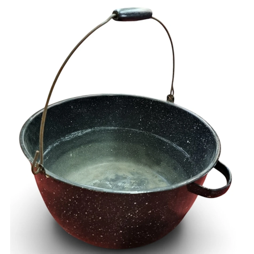 A large grey speckled enamel preserving Kettle with overhead...
