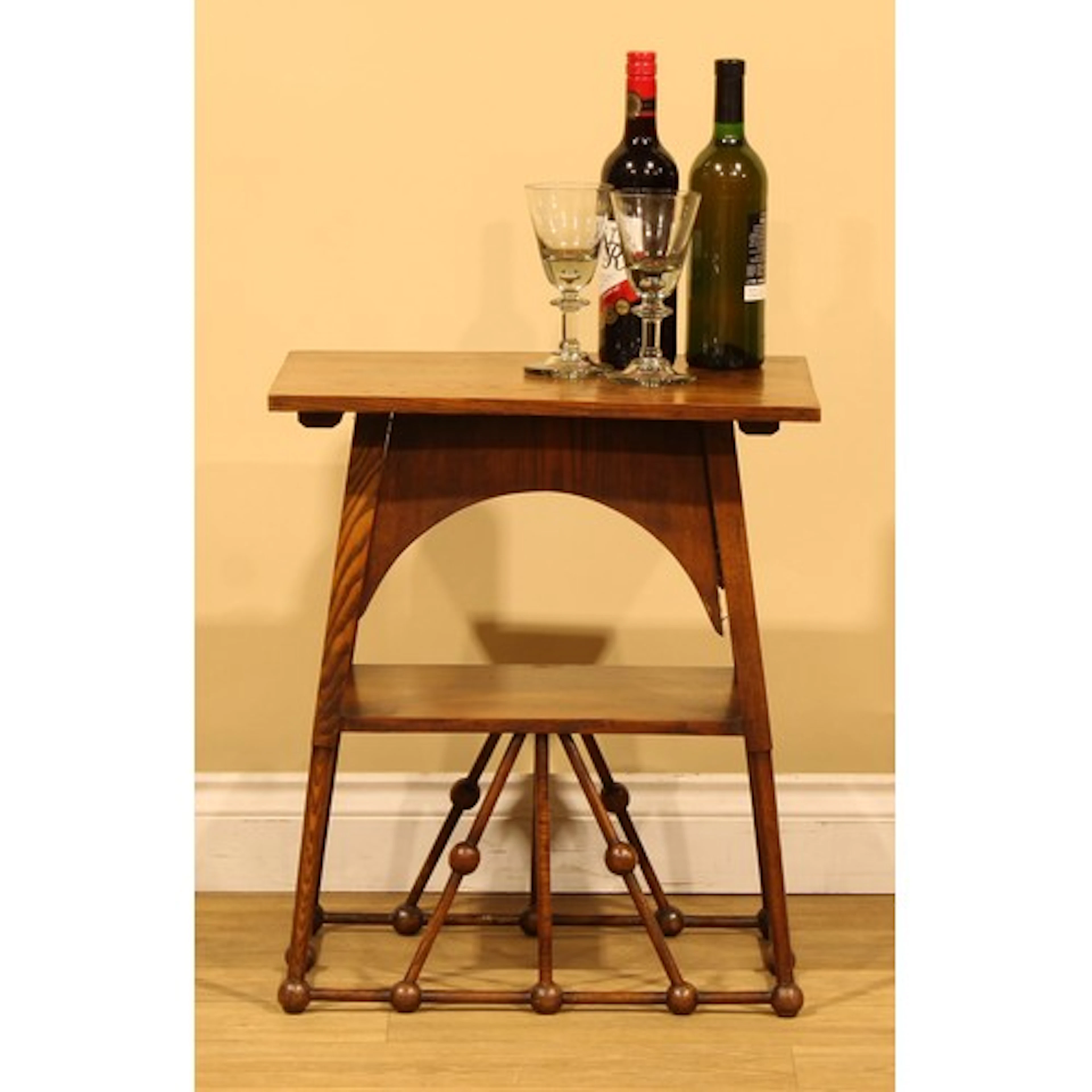 An Aesthetic Movement oak low lamp or occasional table, reta...