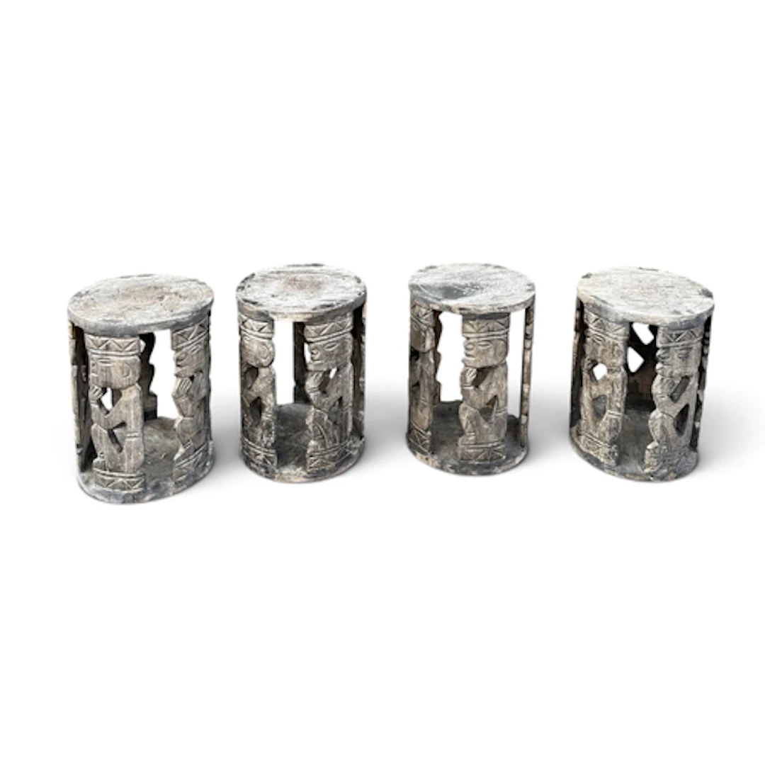 FOUR CARVED AFRICAN STOOLS 25cm x 35cm each