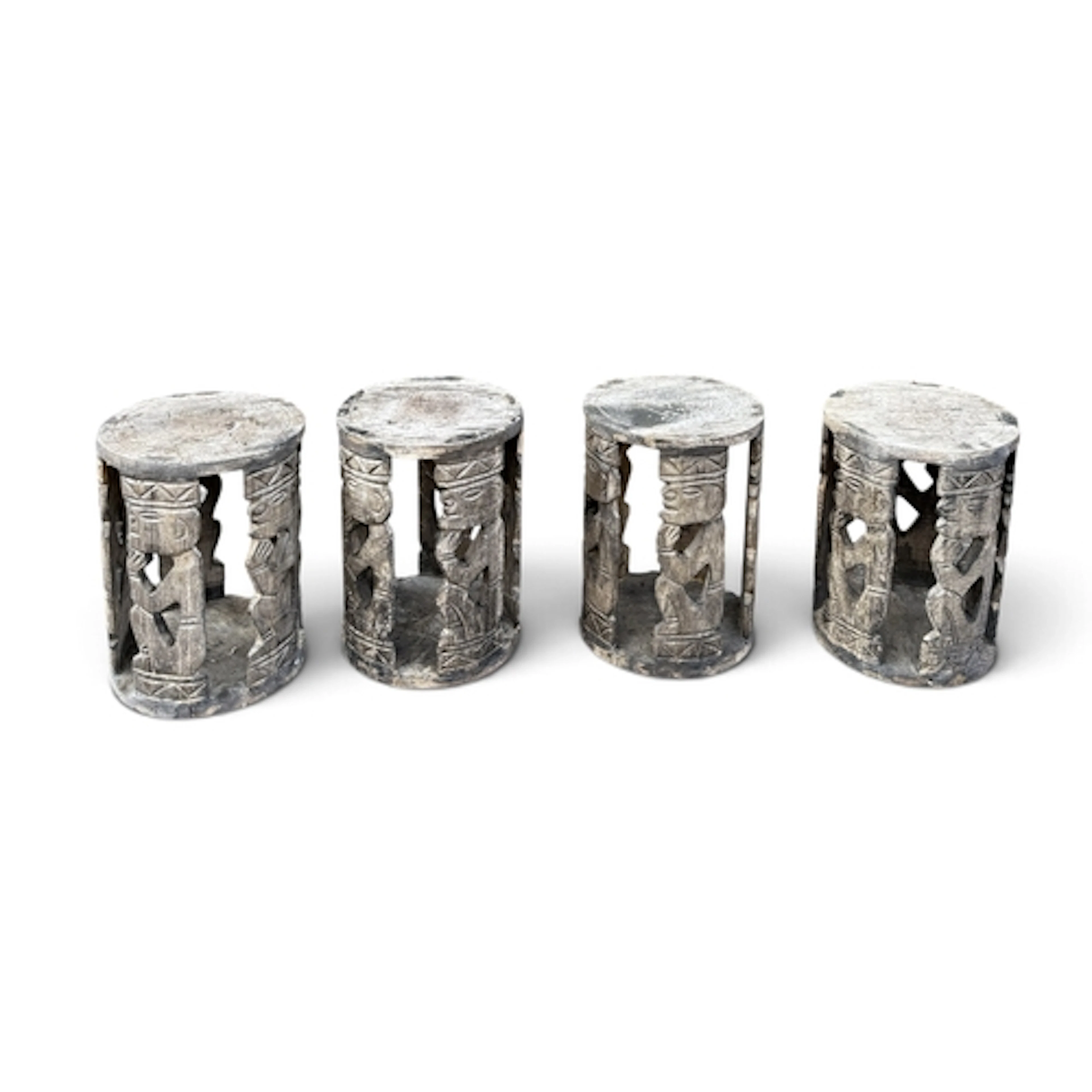 FOUR CARVED AFRICAN STOOLS 25cm x 35cm each