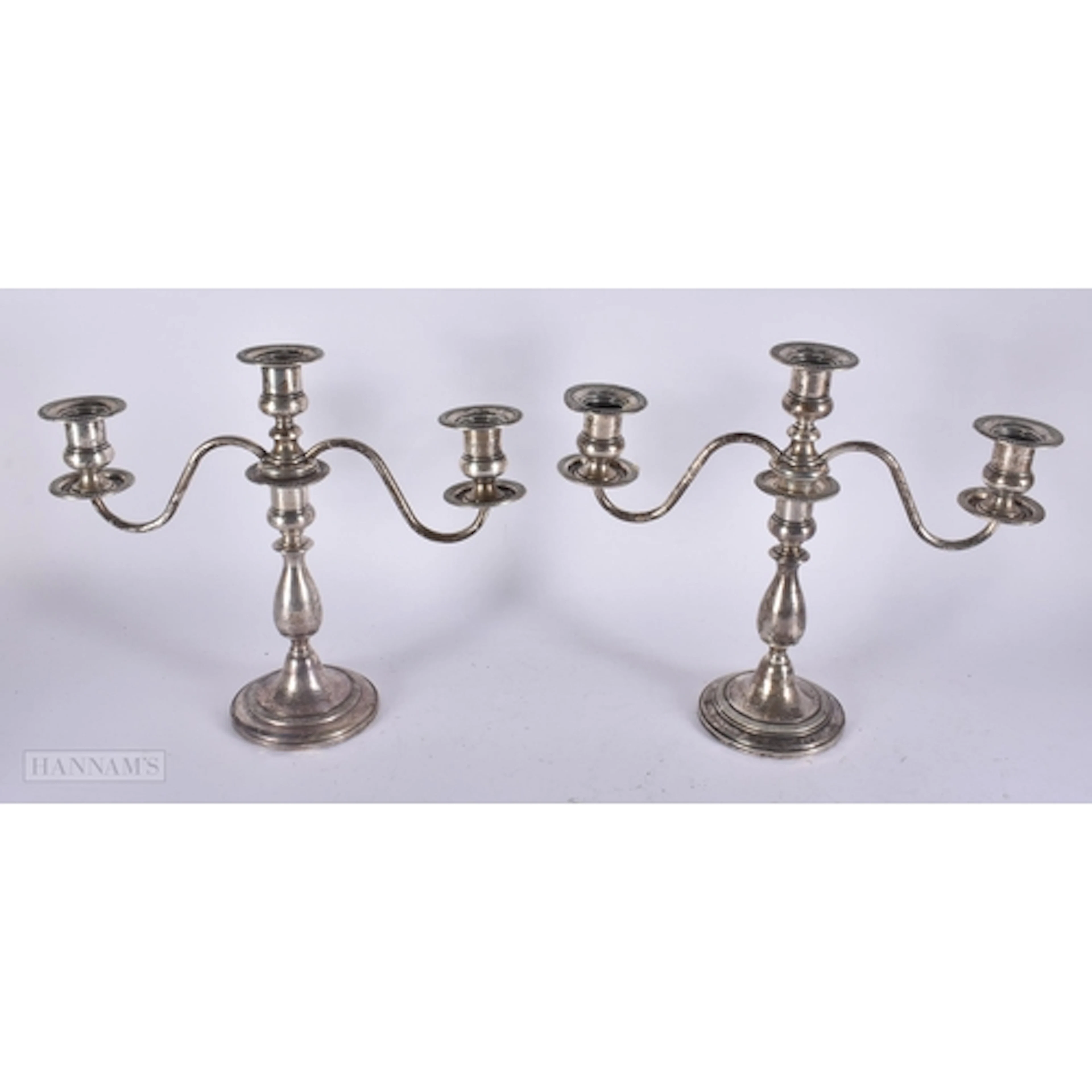 A PAIR OF SILVER CANDELABRA. 1280 grams overall. 35 cm x 25 ...