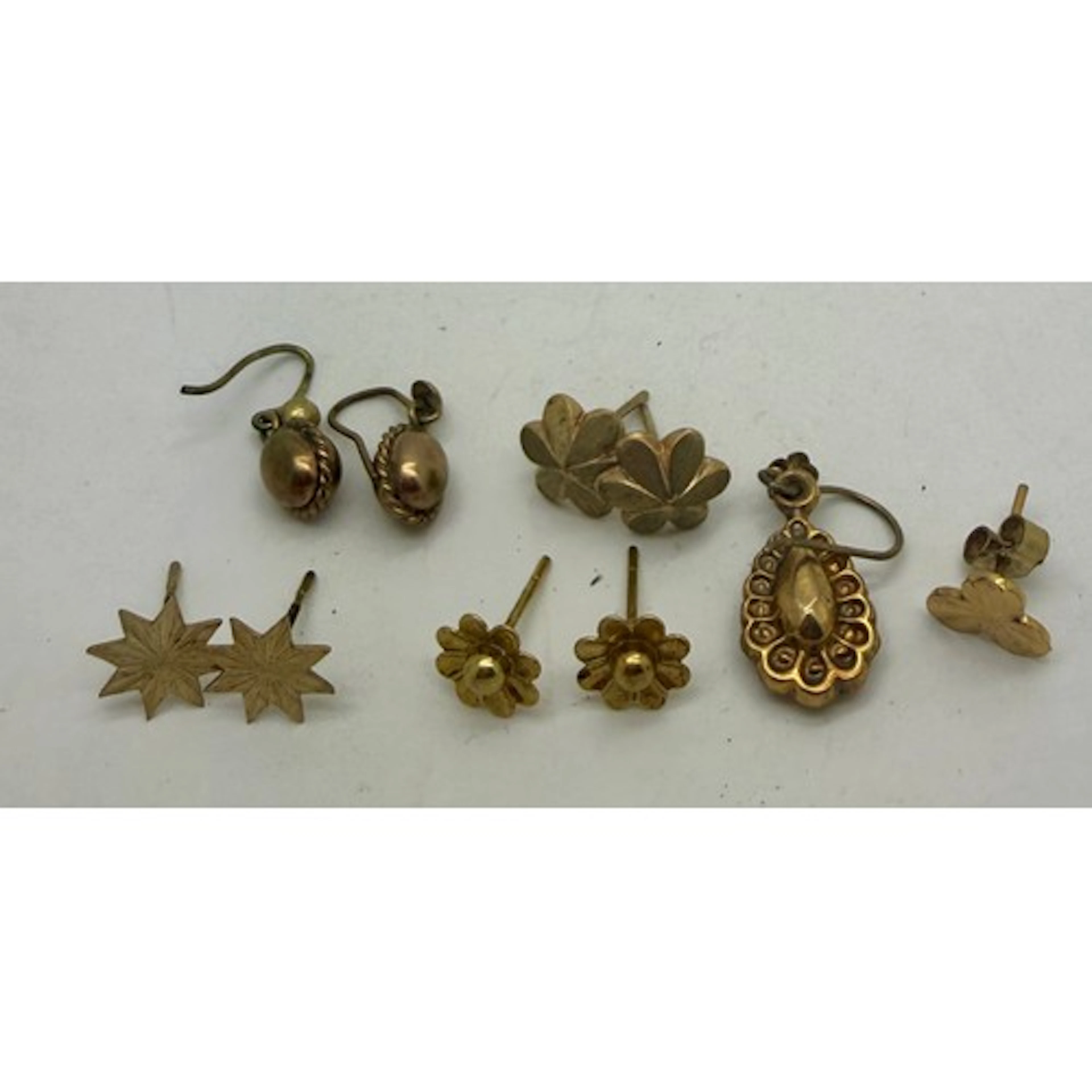 Four pairs of 9 carat gold earrings, single 9 carat gold ear...