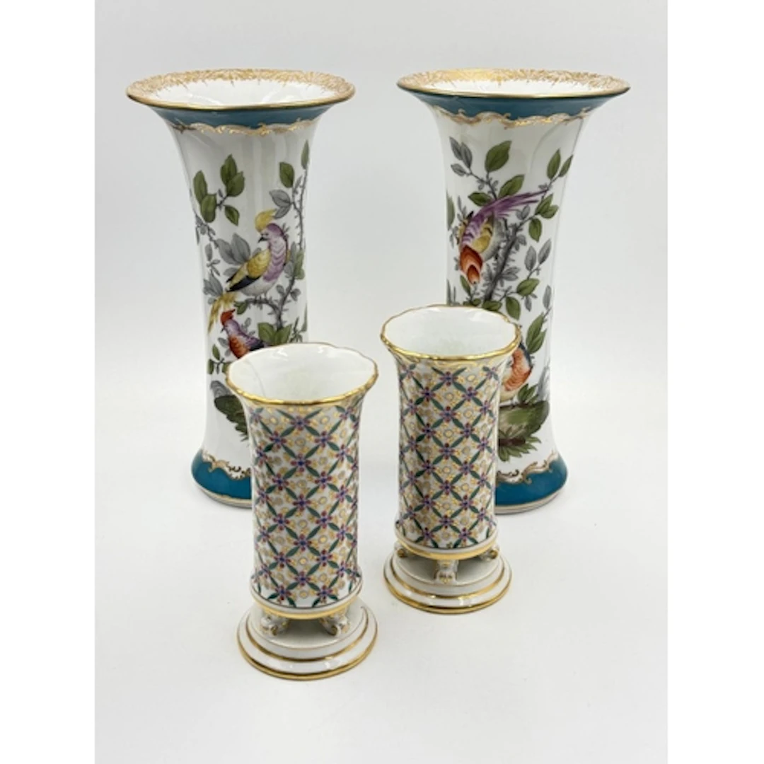 A Pair of porcelain trumpet shape vases with bird and foliag...