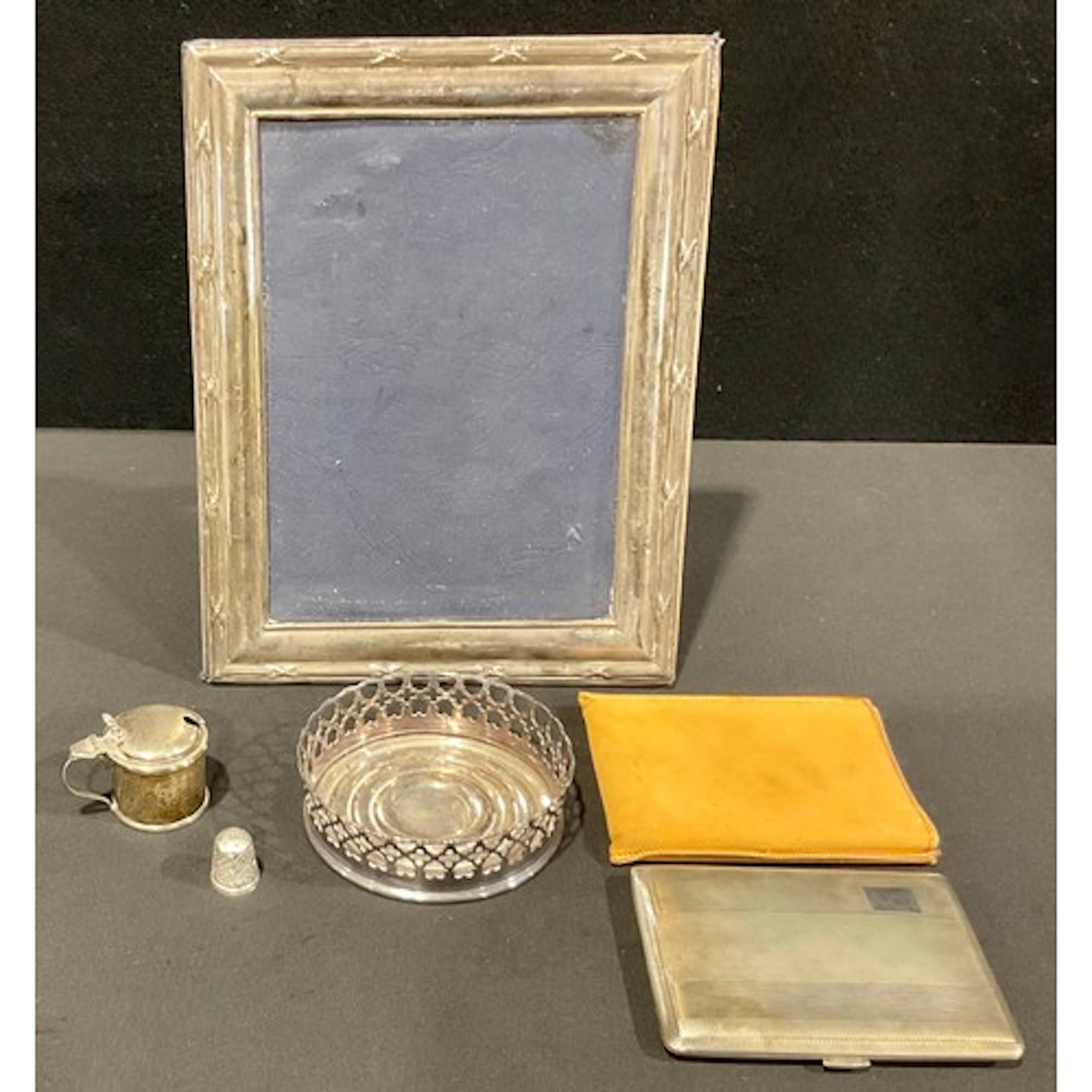 An Elizabeth II silver cigarette case, machined, gilt interi...
