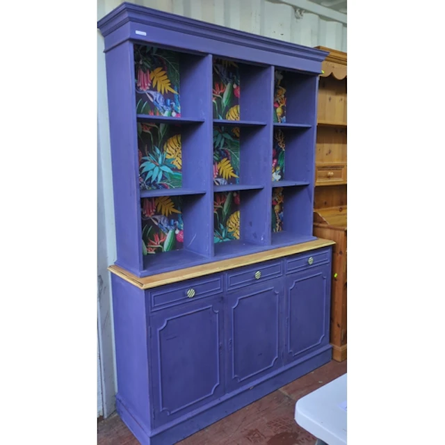 Purple-painted pine kitchen dresser with open, compartmented...