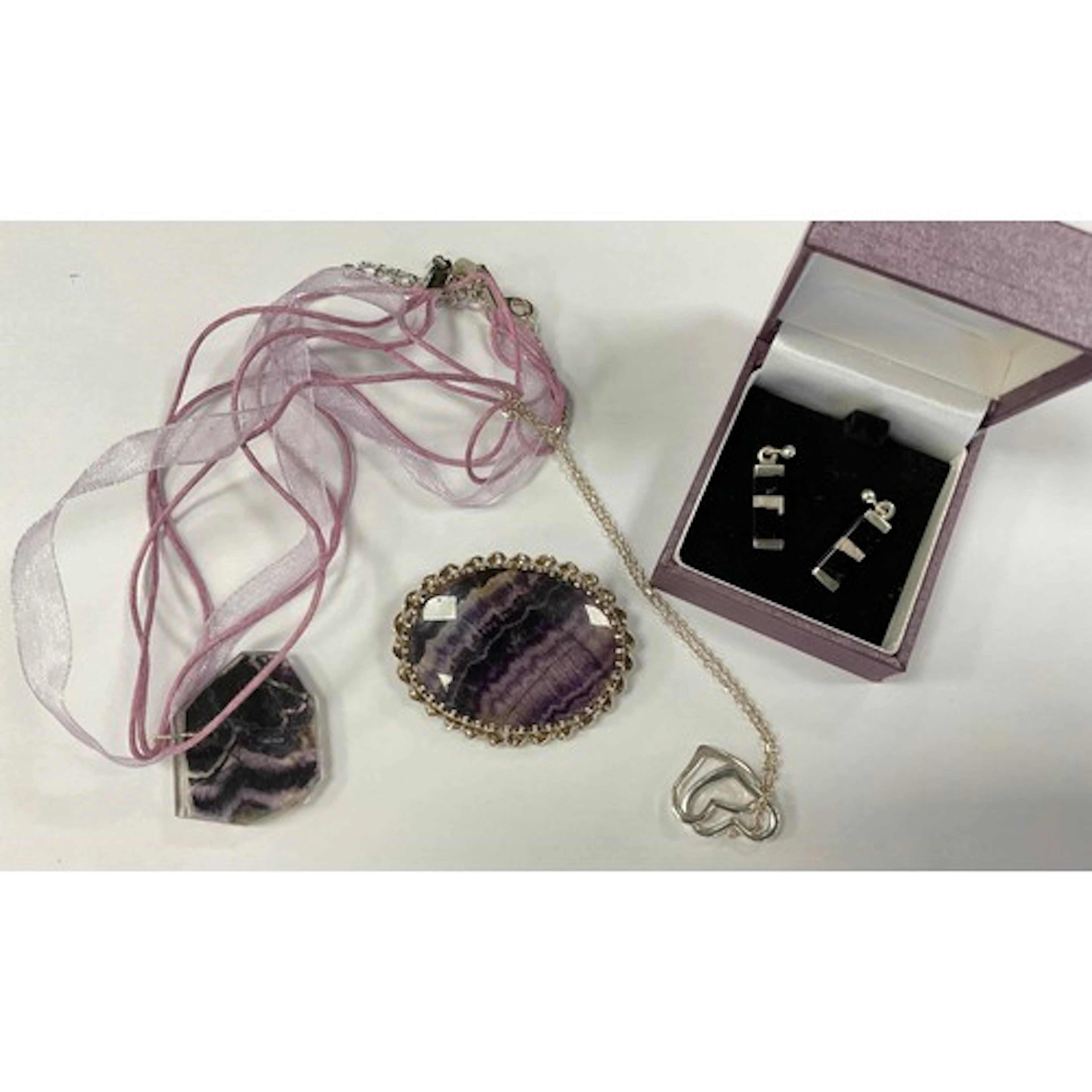 A silver mounted oval Blue John Fluorite brooch, mount Paul ...
