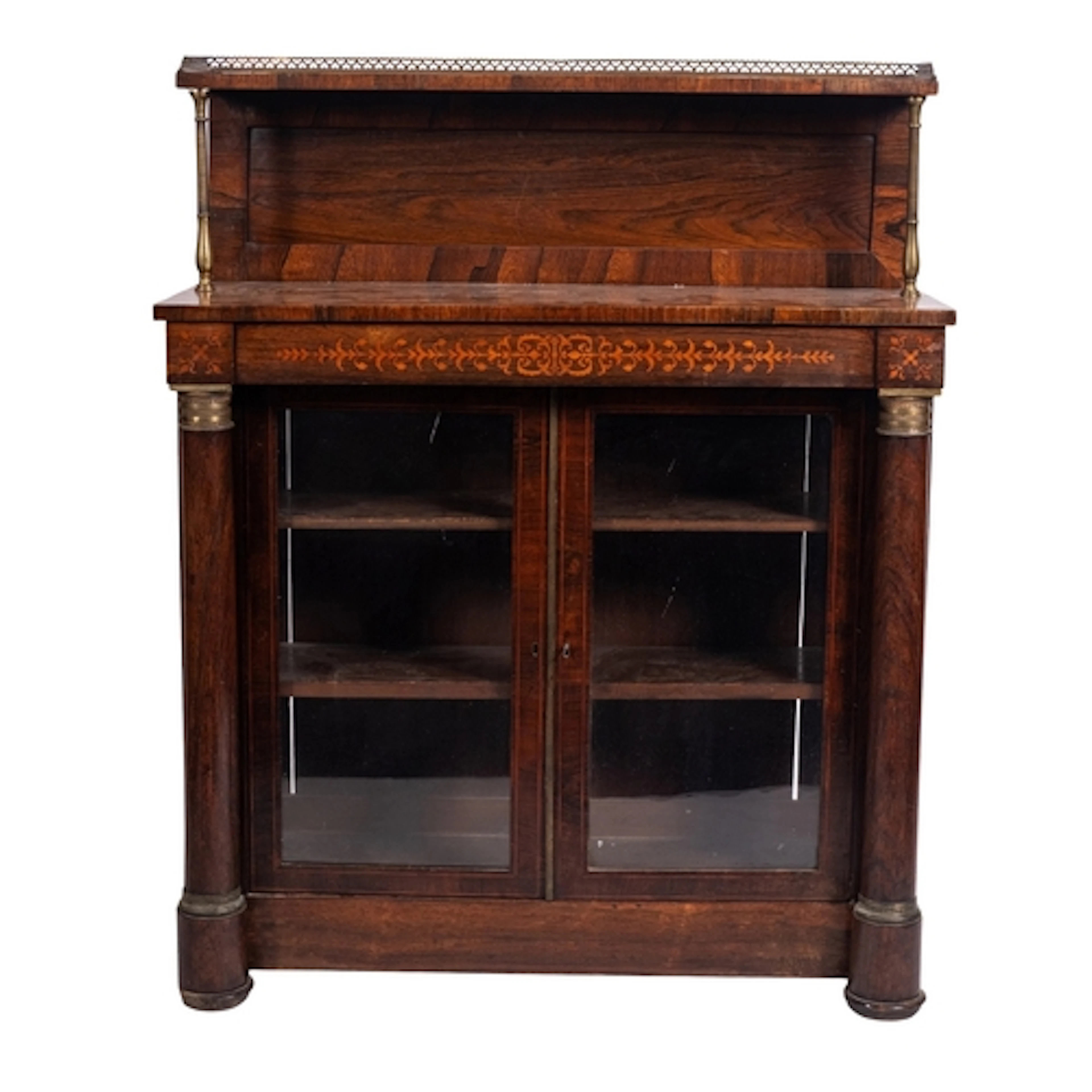 A Regency rosewood chiffonier, circa 1815; the raised shelf ...