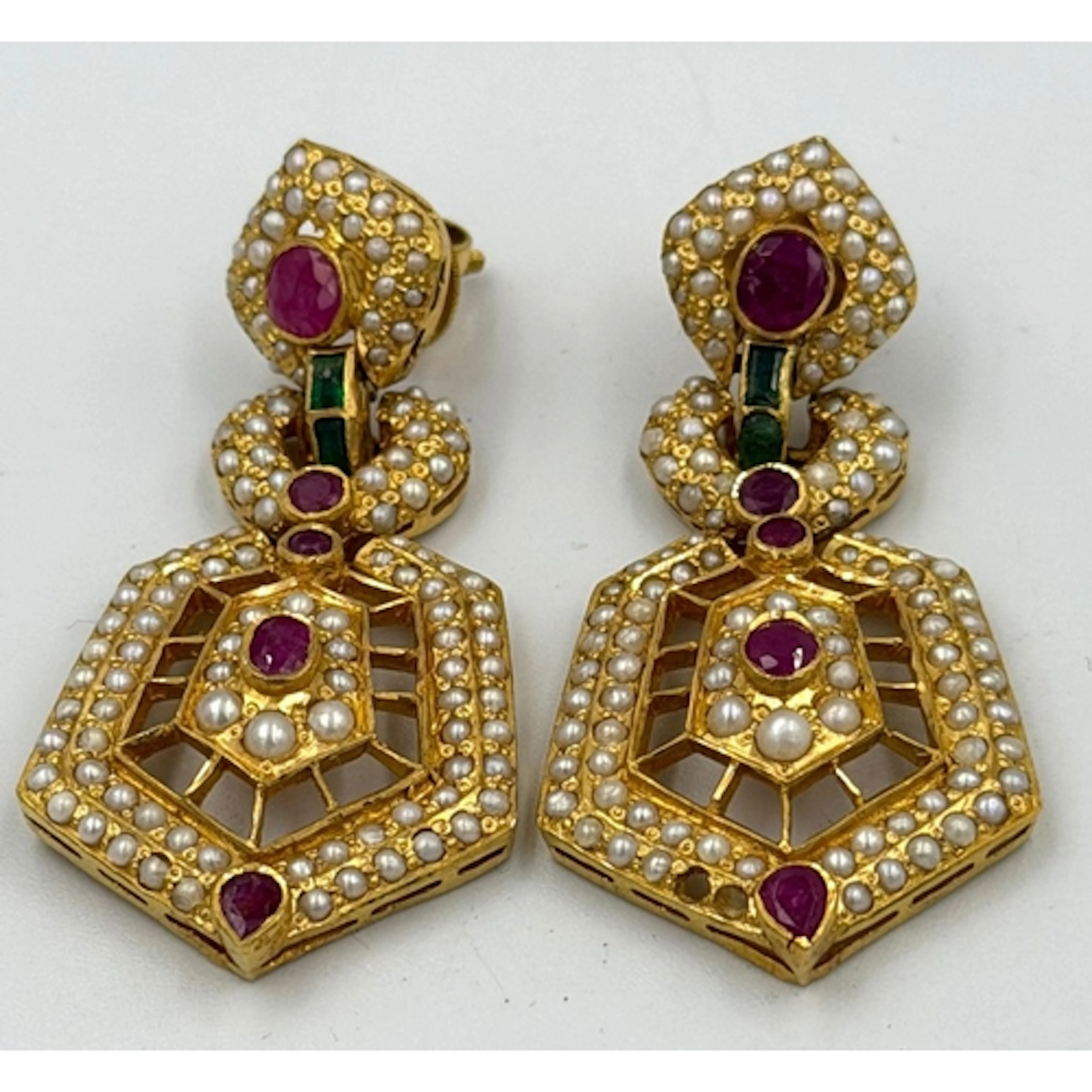 A pair of Arabian gold, marked 916 precious stone and seed p...