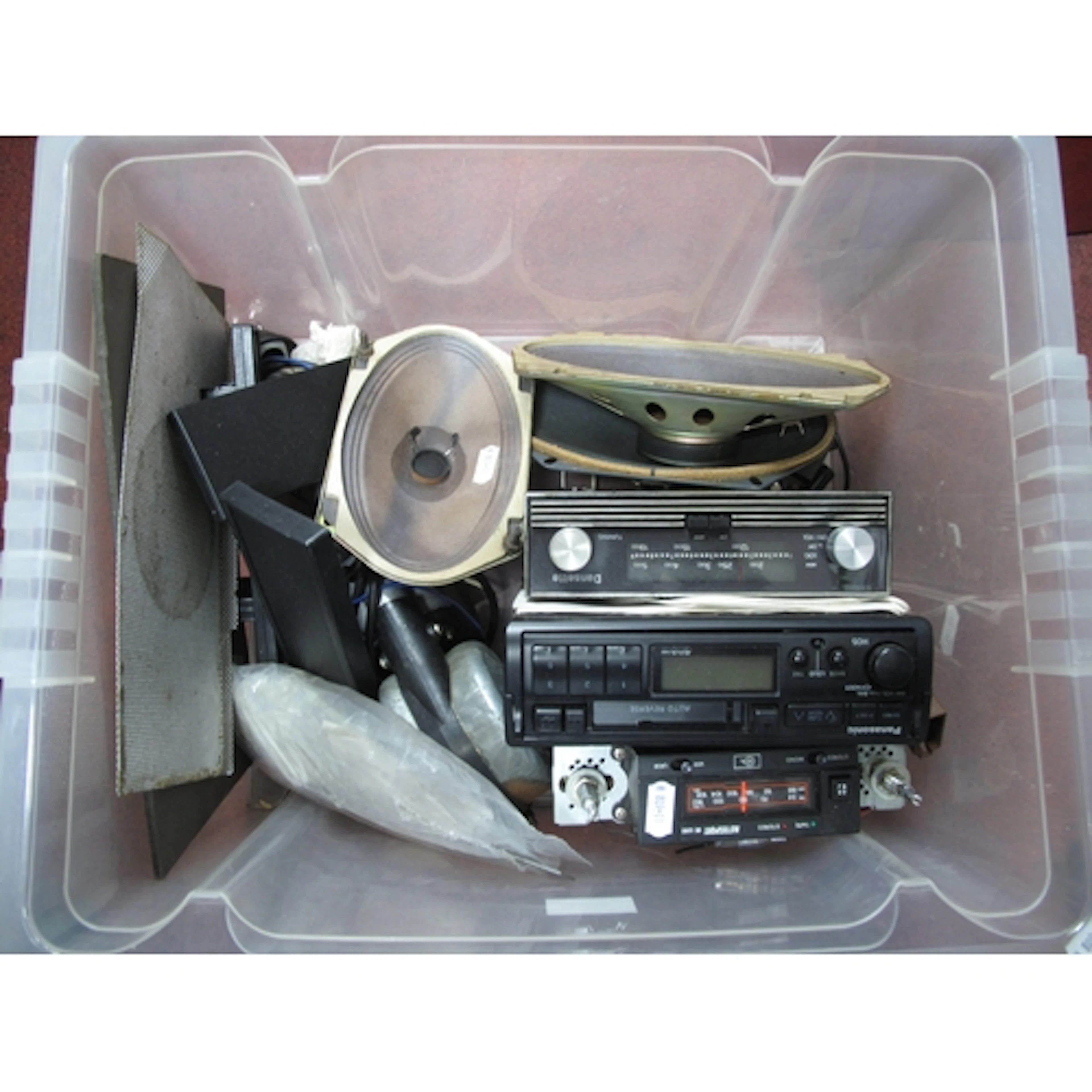 Vintage car audio parts, including three car radios, compris...