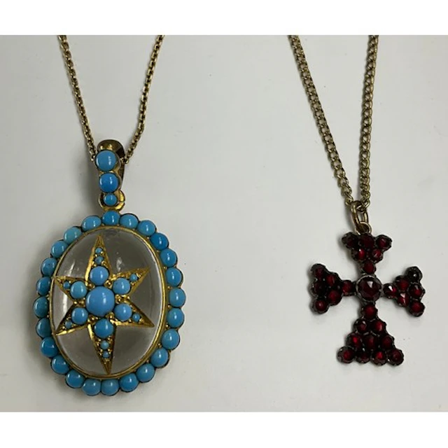 A Victorian turquoise paste and gilt metal pendant, rolled g...