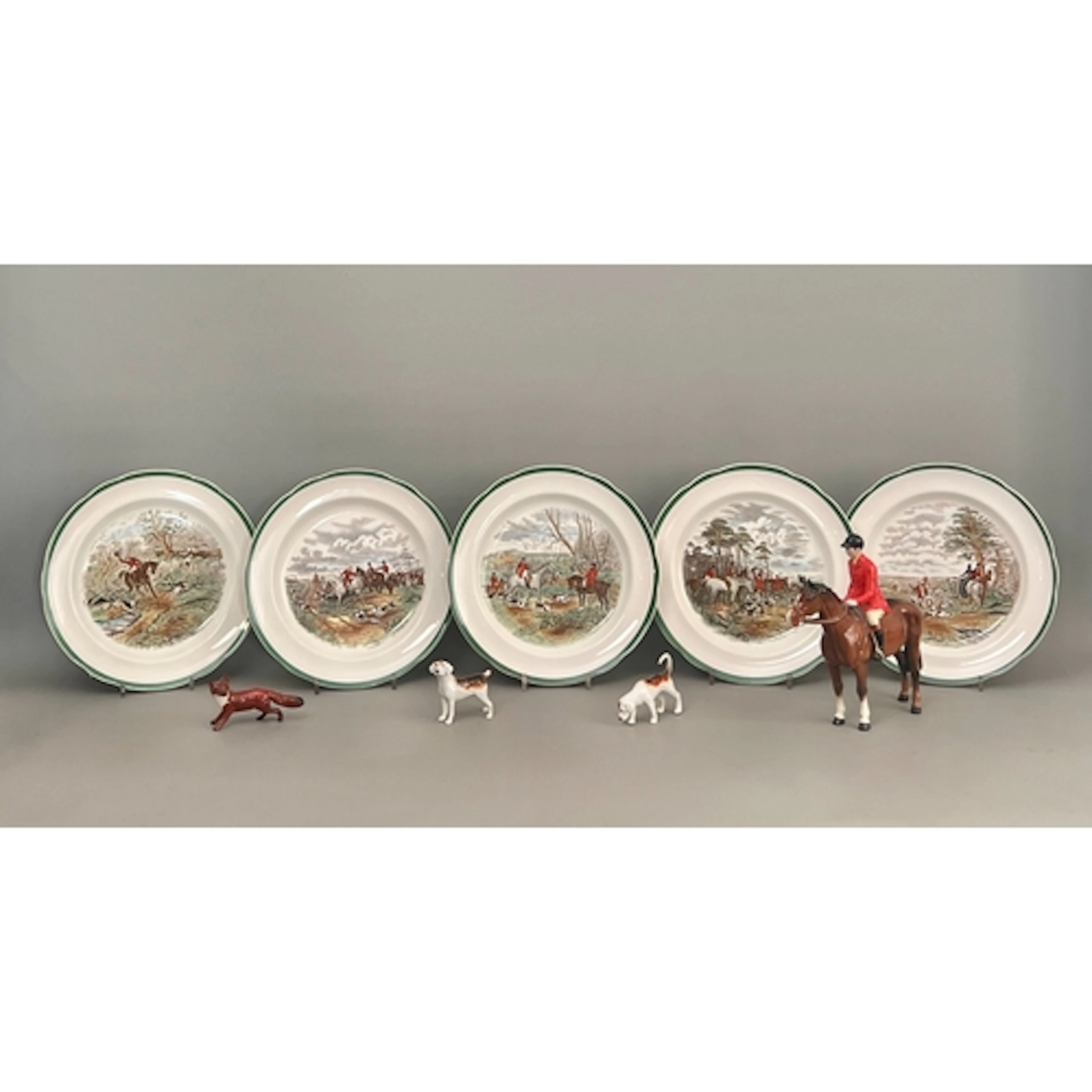 A Beswick fox hunting group - comprising a huntsman on horse...
