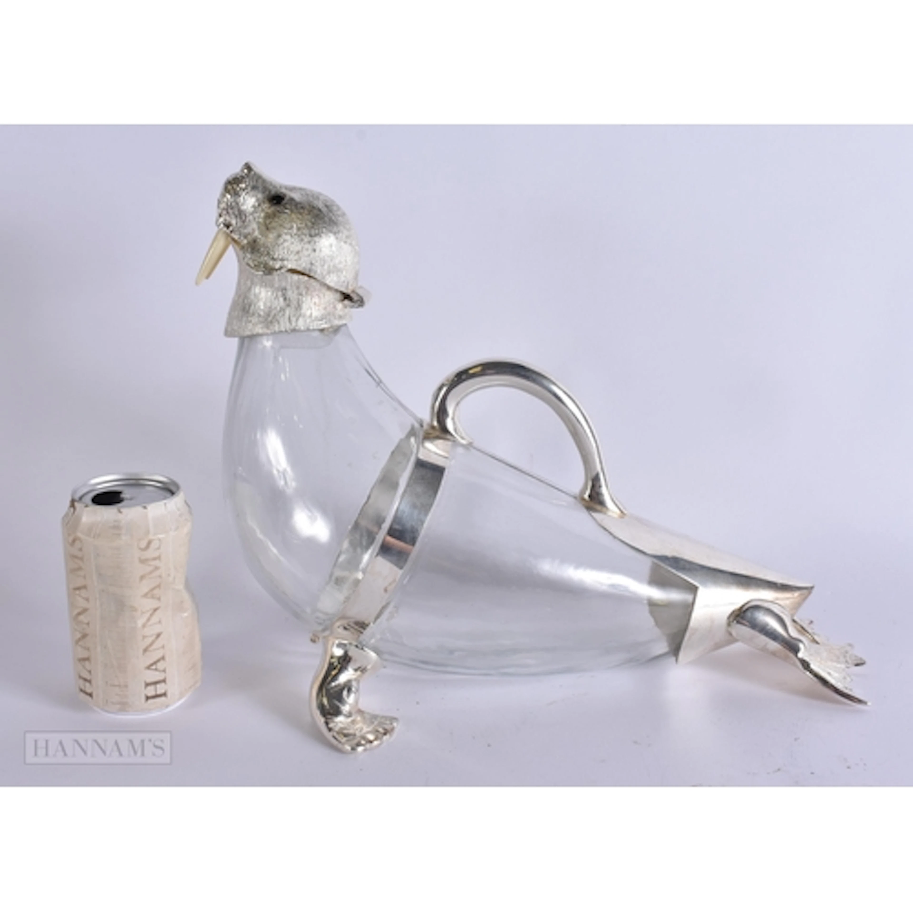 A LARGE SILVER PLATED WALRUS JUG DECANTER. 36 cm x 26 cm.