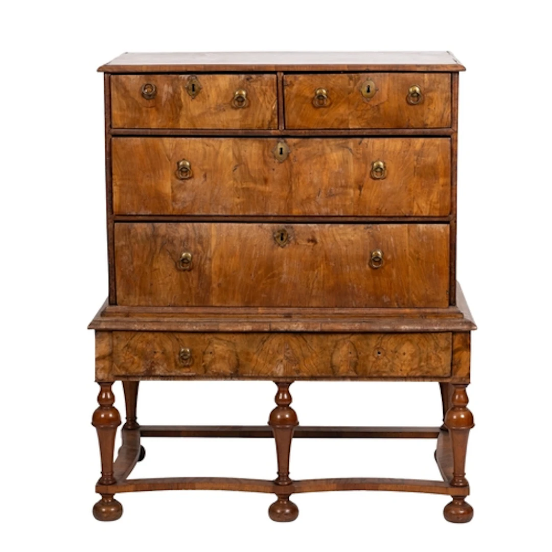 A George I walnut chest on stand, circa 1725 and later; the ...
