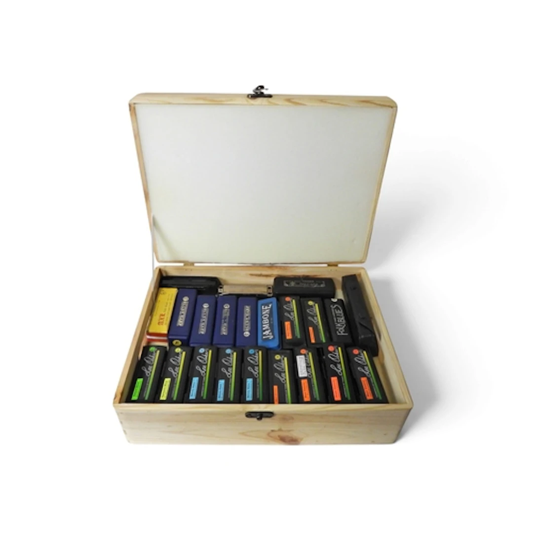 Mouth Organs - A wooden case of 21 Harmonicas including mult...