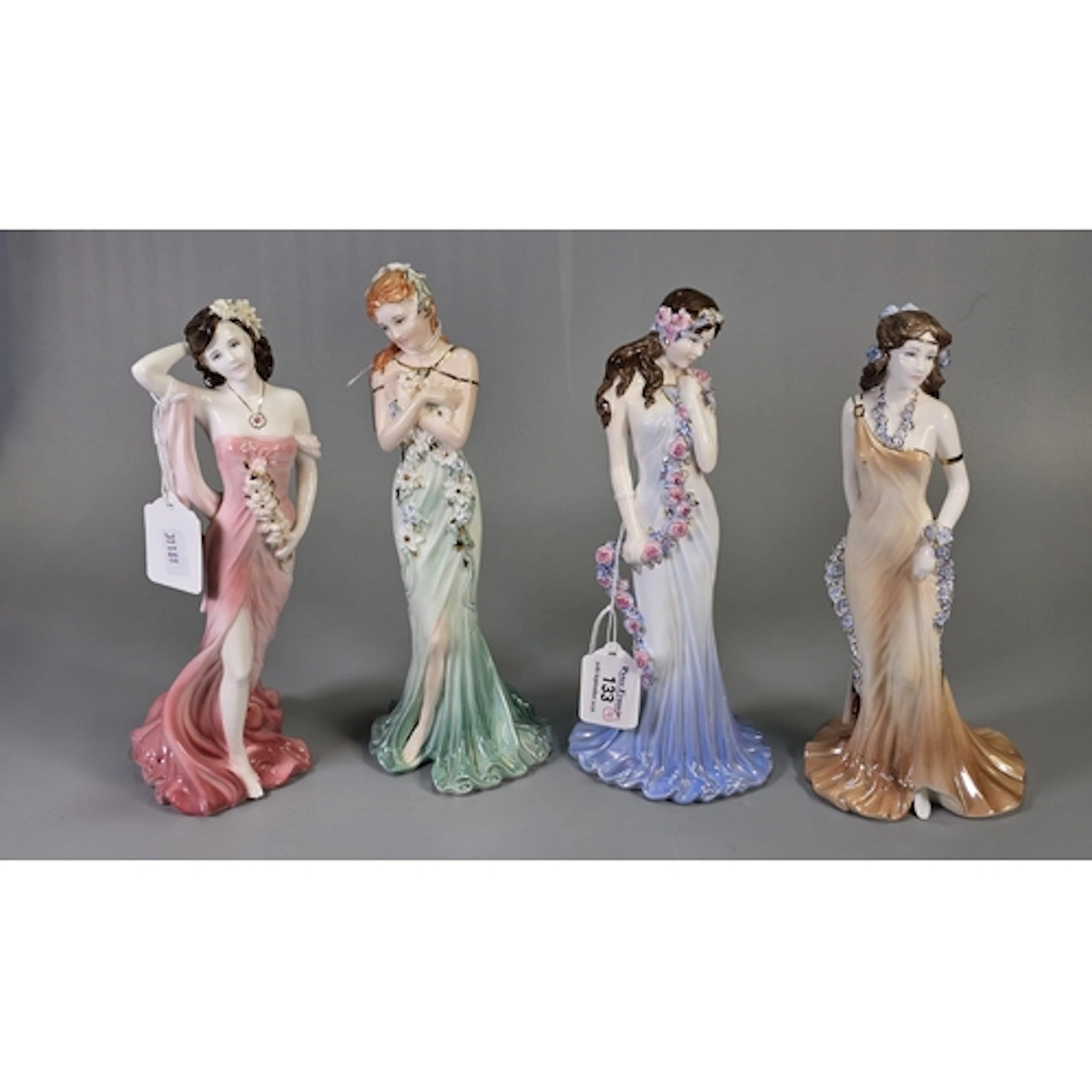 Four Coalport bone china figurines, ‘Emerald’, ‘Sapphire’, ‘...