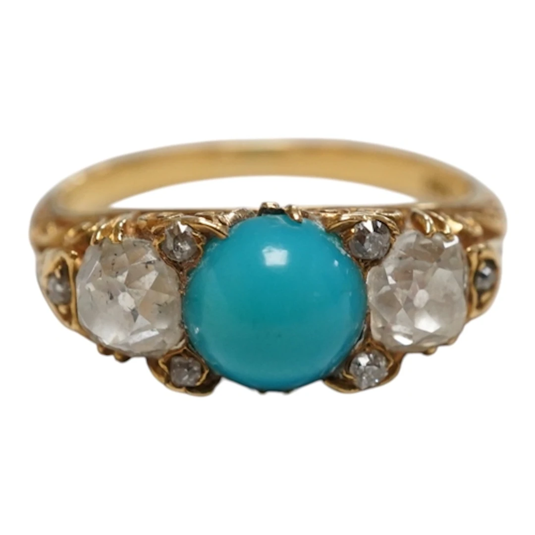 A yellow metal, single stone turquoise and two stone diamond...