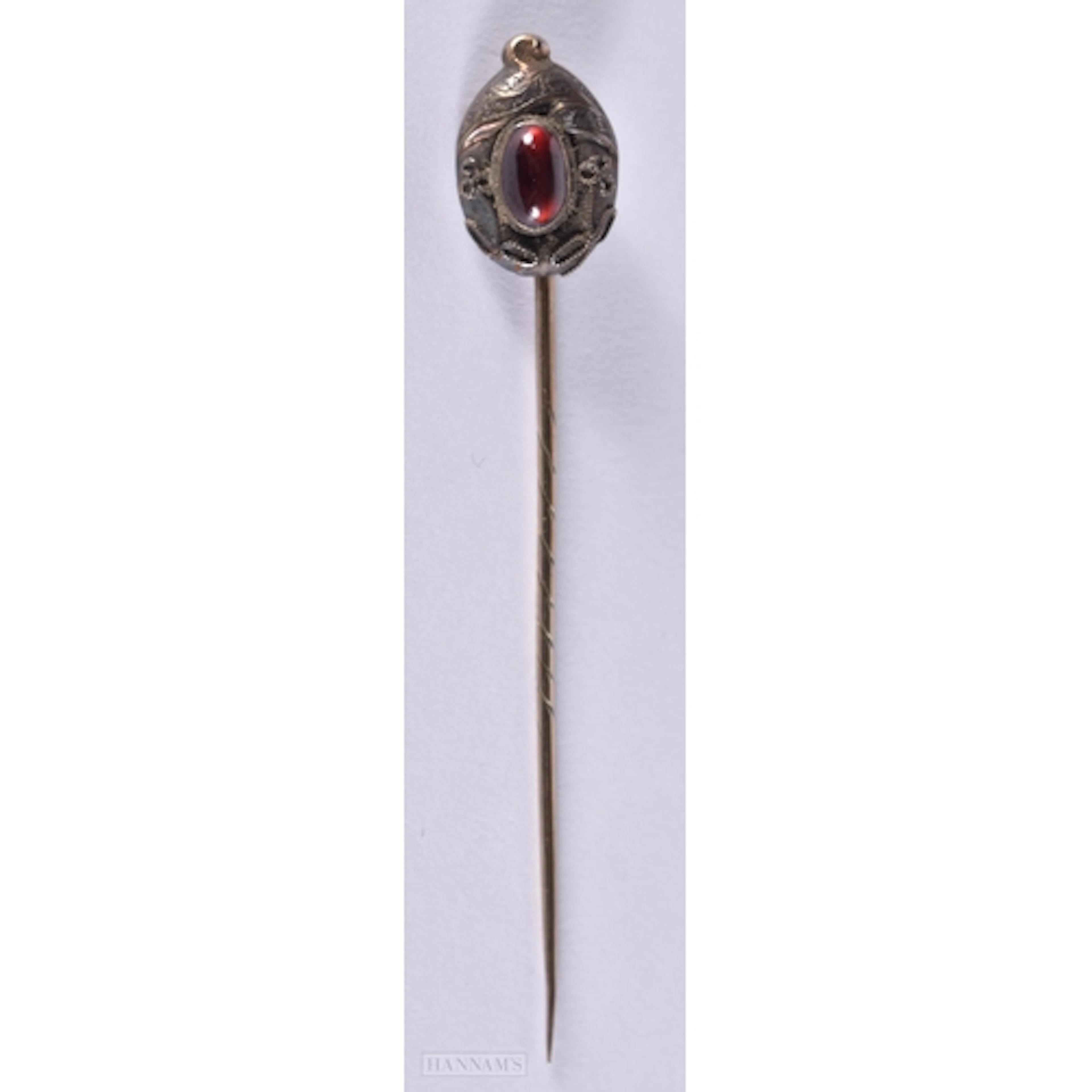 An Antique Victorian Etruscan Revival gold garnet stickpin, ...