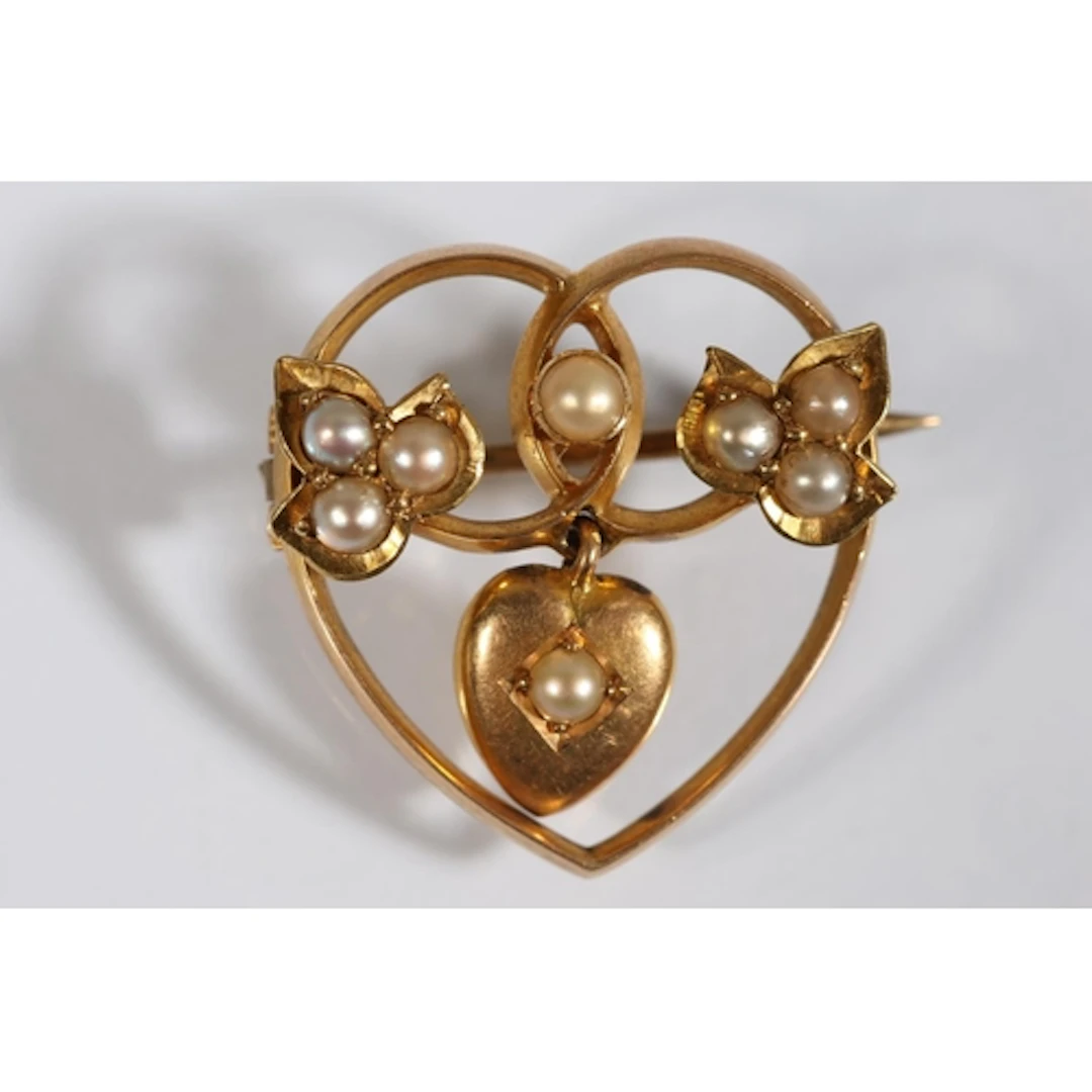 Gold tone and seed pearl heart shaped brooch, 2.7g gross, 2c...