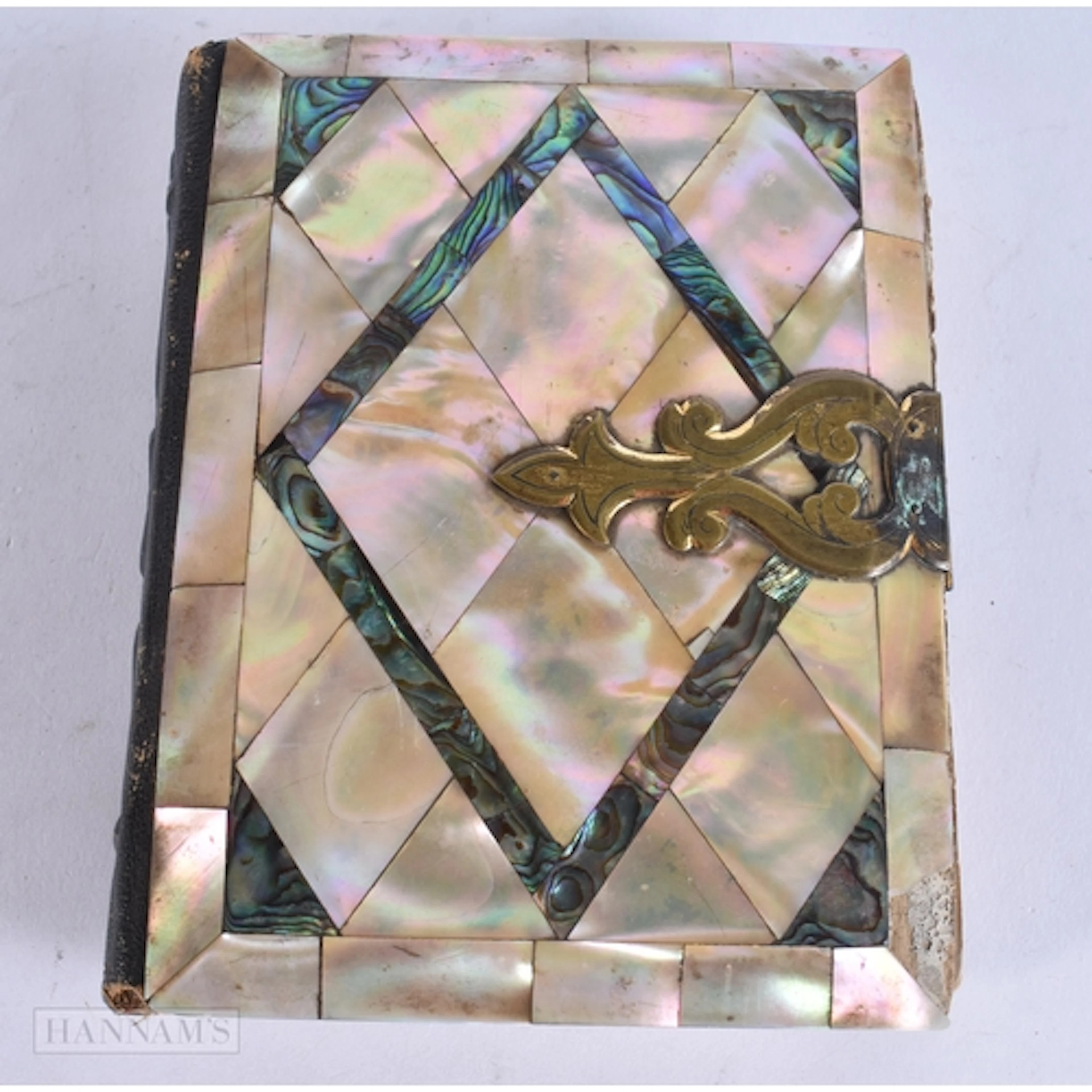 A VICTORIAN MOTHER OF PEARL PHOTOGRAPH ALBUM. 15.5 cm x 12.5...