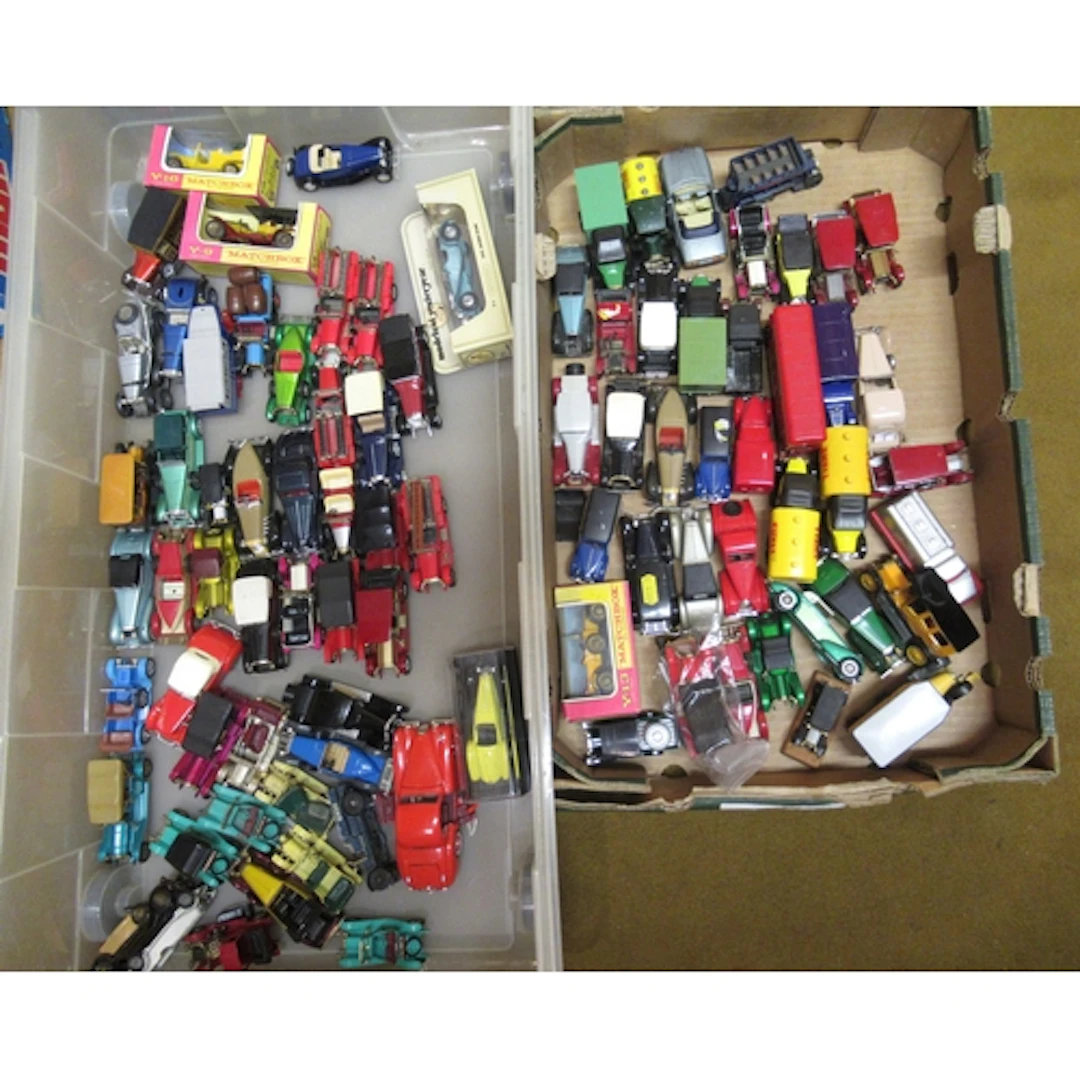 Two boxes containing a quantity of diecast metal model vehic...