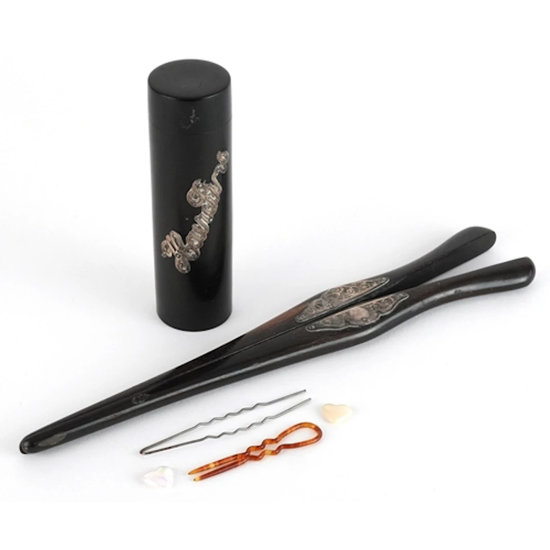 Pair of Victorian silver mounted glove stretchers and a silv...