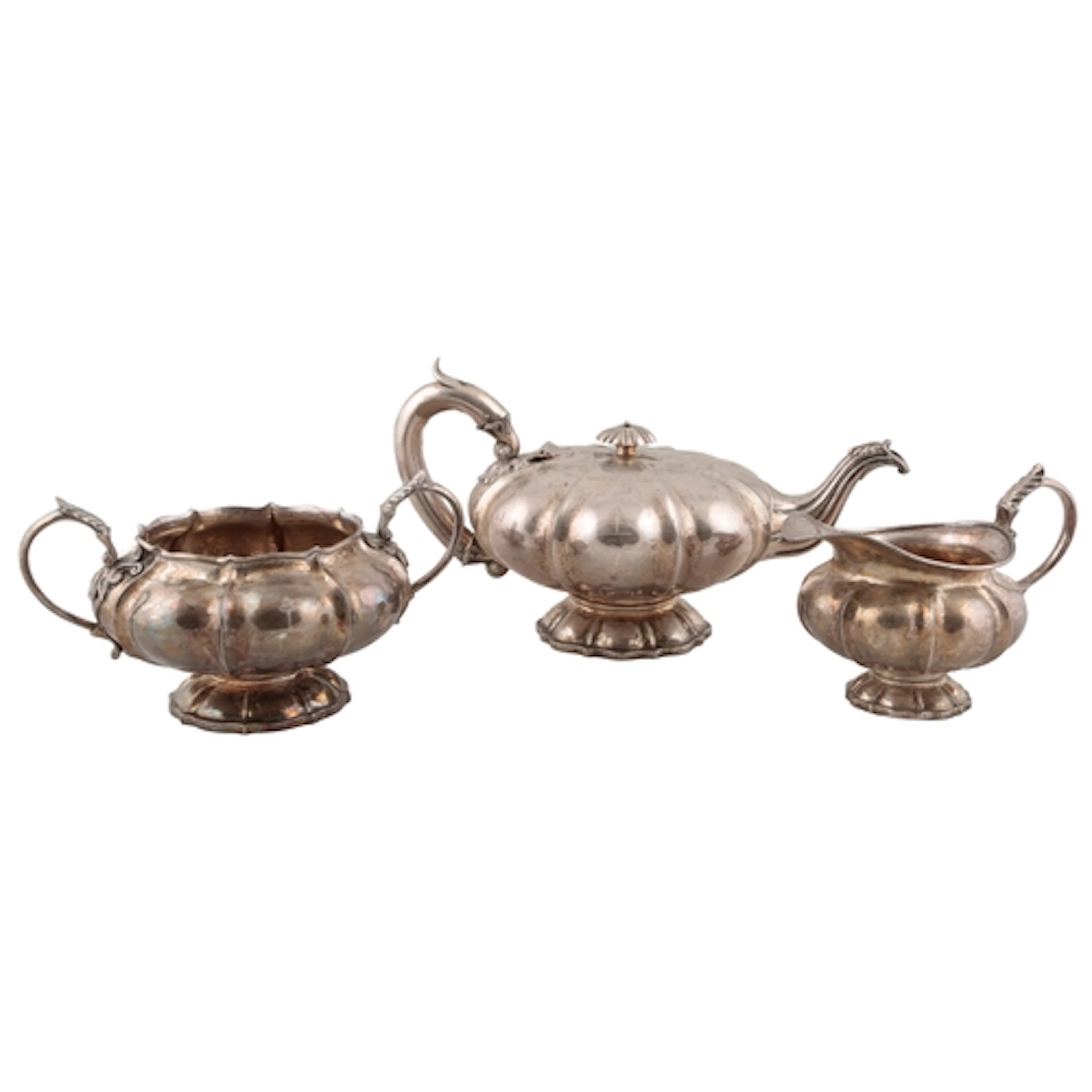 A William IV Irish silver melon shaped three piece tea set, ...