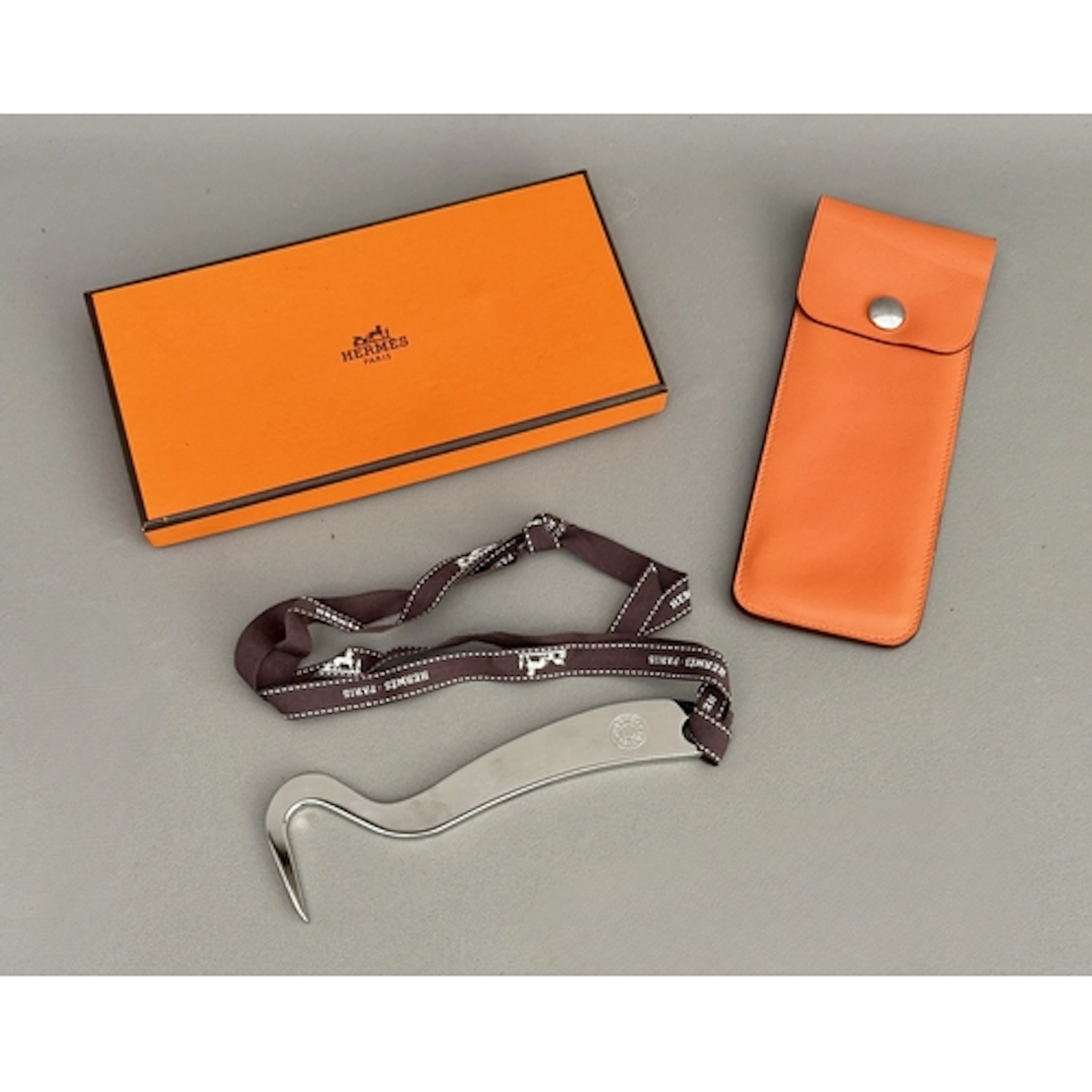 A Hermes chrome finish hoof pick - boxed and with its calf s...