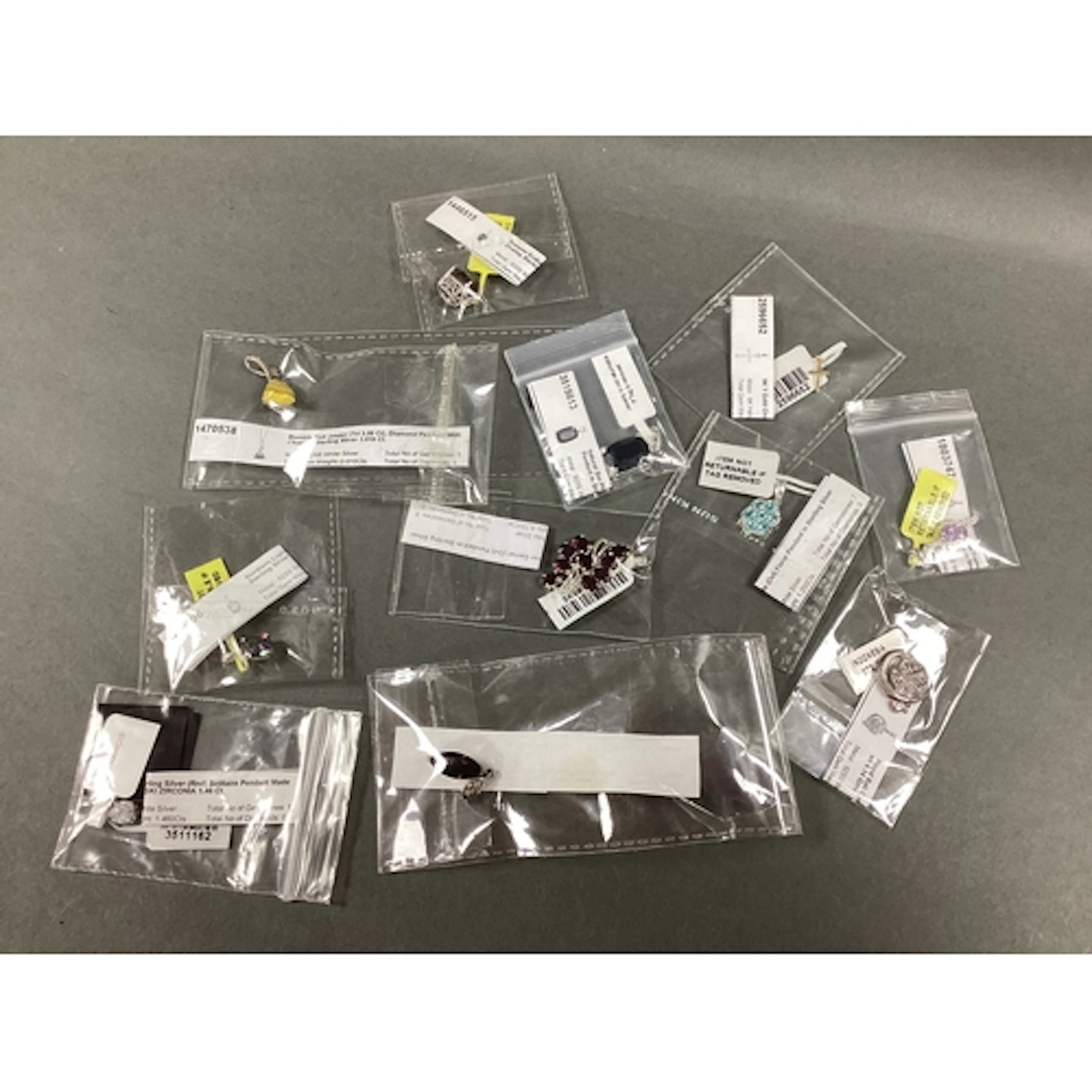 A Collection of Modern "925" Stone Set and Other Pendants, i...