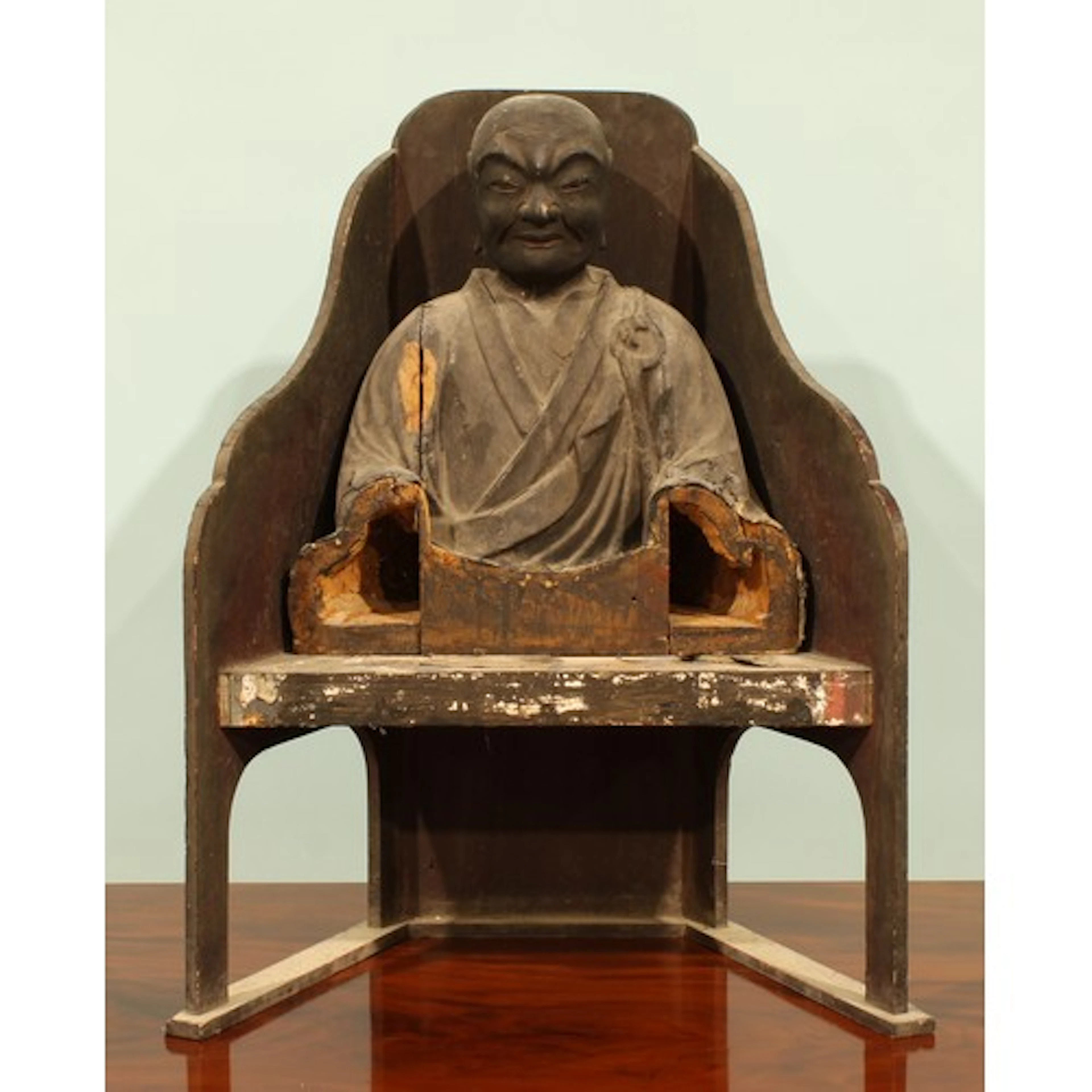 A Japanese softwood and Washi paper temple figure, of a Budd...