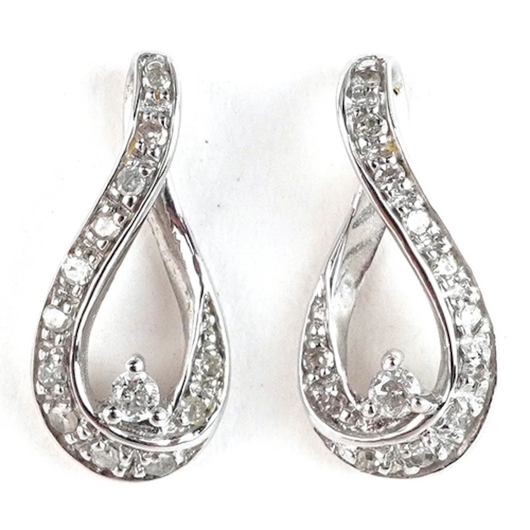 Pair of 9ct white gold diamond teardrop stud earrings, 13.5m...