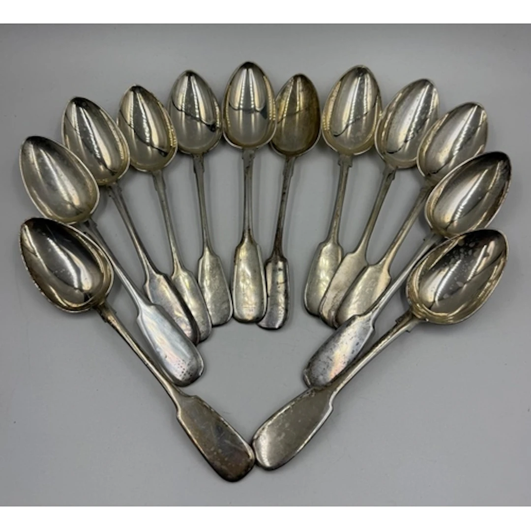 A set of twelve Russian silver tablespoons, marked with the ...