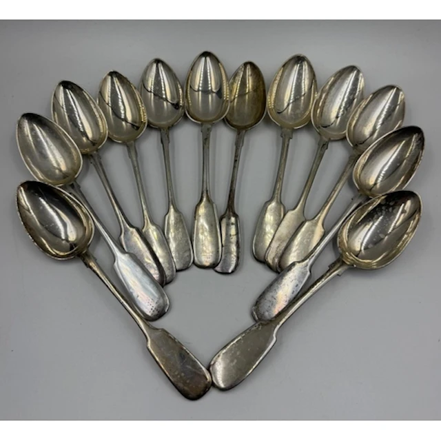 A set of twelve Russian silver tablespoons, marked with the ...
